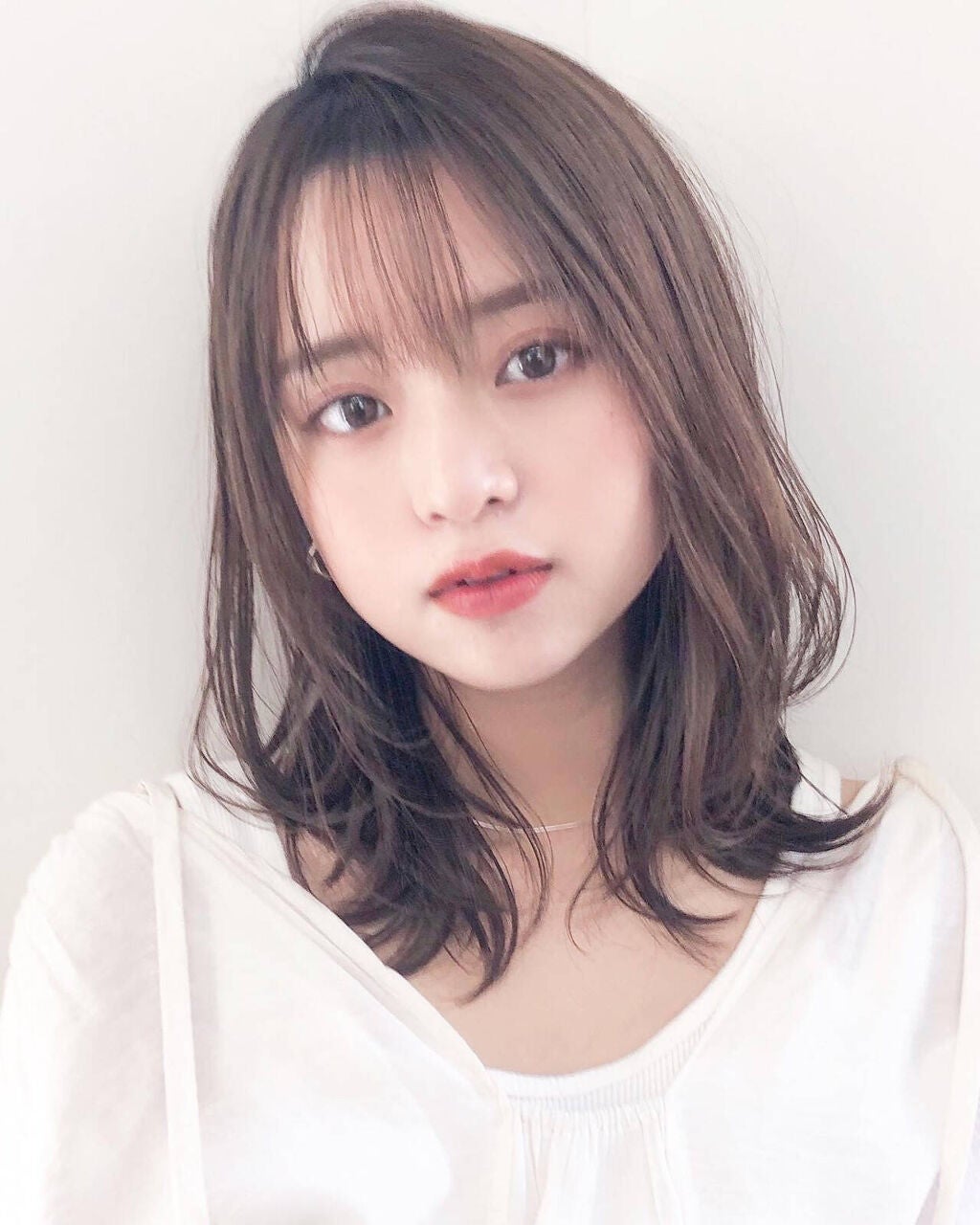 外ハネセミロングヘア