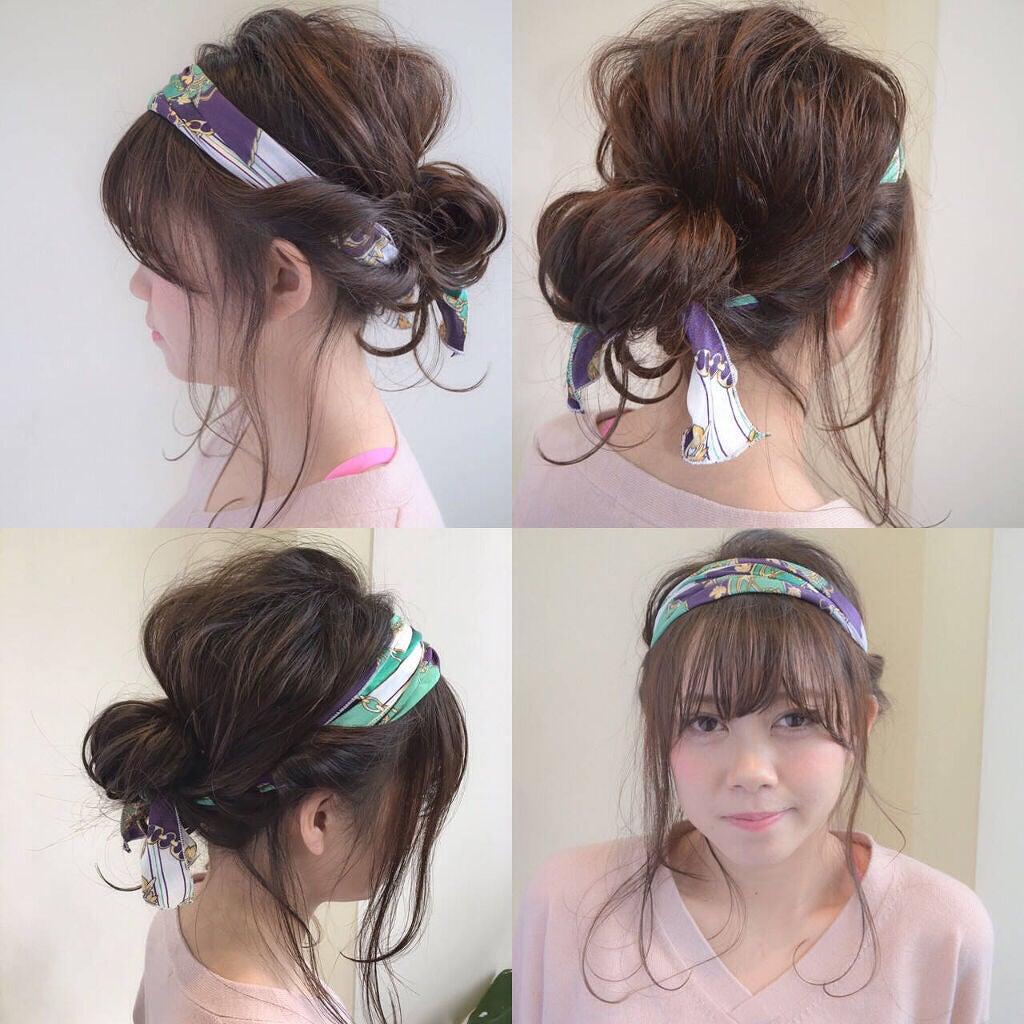 まとめ髪にヘアバンドをつけている女性