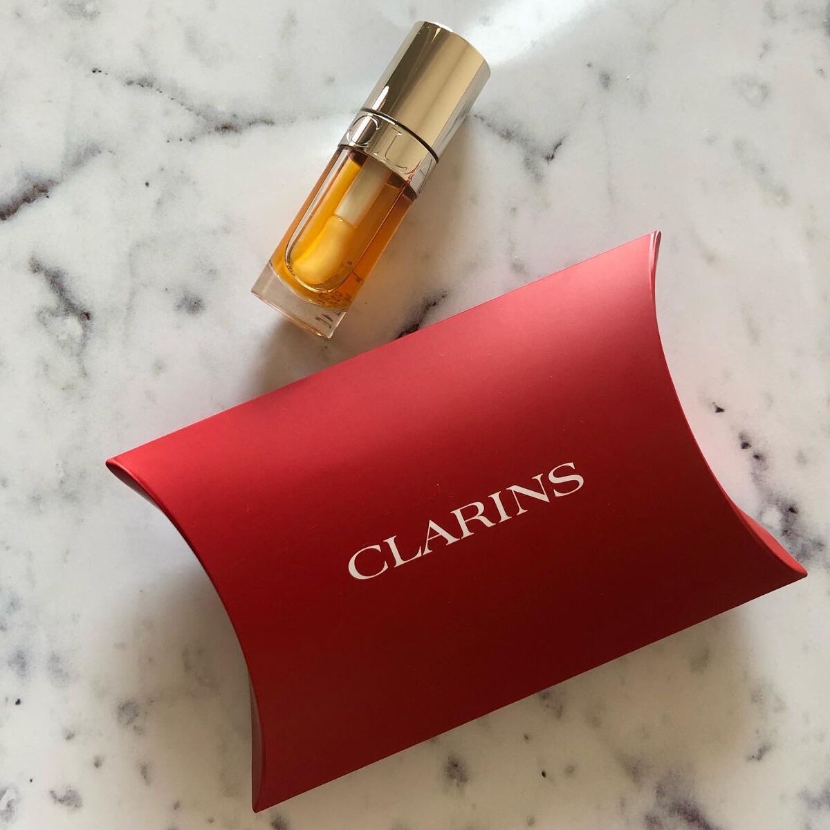 リップコンフォートオイル 01 ハニー/CLARINS/リップグロスを使ったクチコミ（1枚目）