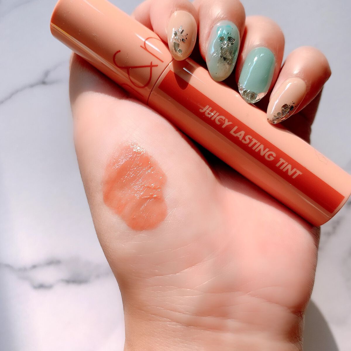 ジューシーラスティングティント/rom&nd/リップティントを使ったクチコミ(2枚目)