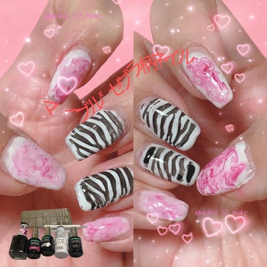 〚マーブルとゼブラ柄のコラボ🦓♥〛


安定の１００均のカラージェル🌟

使ったカラージェルは
セリア
・MAGENTA
・WHITE
・BLACK

DAISO
・10 ホワイト
all１１０円


