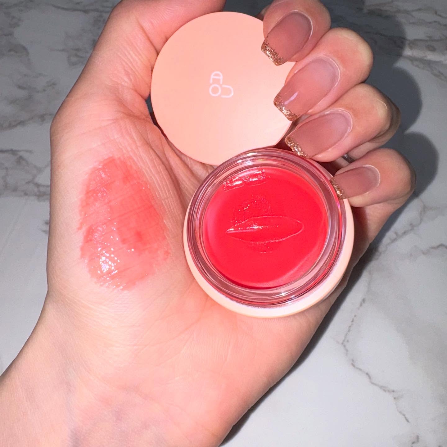 GLOWY TINT BALM 02 PERSIMMON BALM/AOU/リップグロスを使ったクチコミ（1枚目）