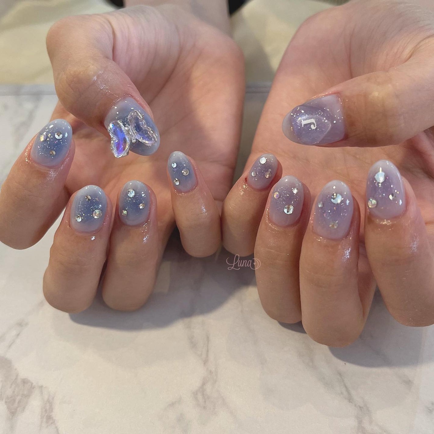 Iuna. Mizuki on LIPS 「.スペシャルプラン💙🦋#nail#nailstagram#ge..」(3枚目)