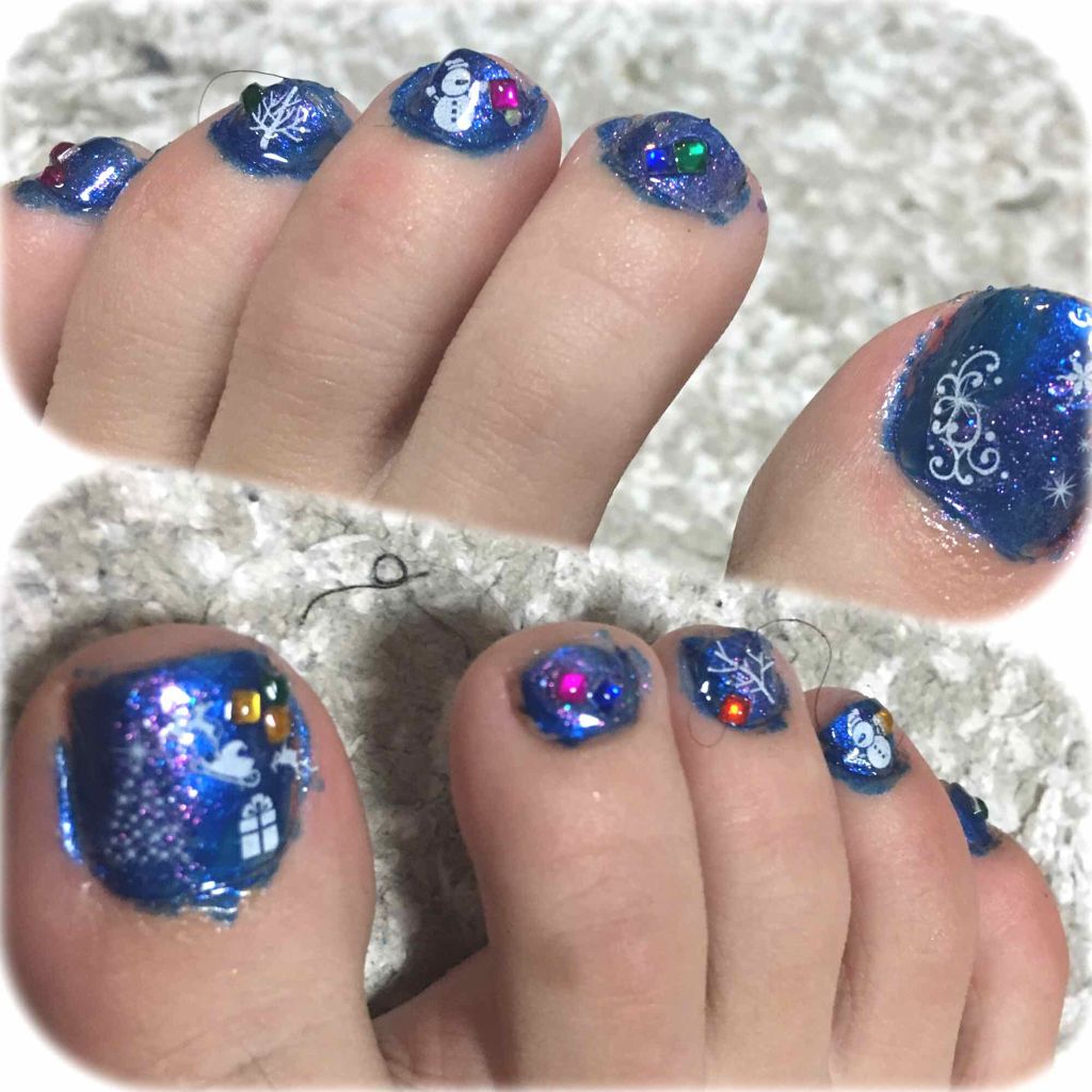 pomer24 on LIPS 「フットネイルを冬仕様にDAISOのネイルシールと青ベースにオー..」(1枚目)