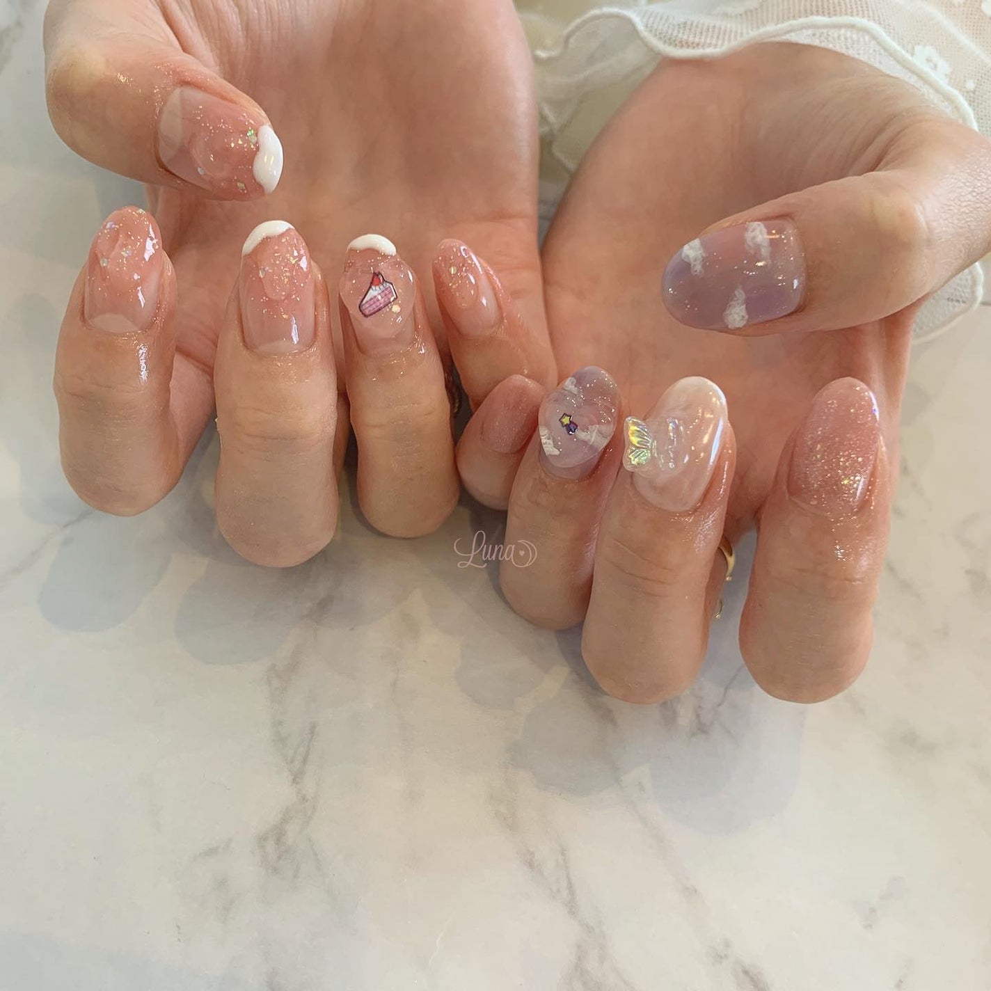 Iuna. Mizuki on LIPS 「.Cプランアレンジ🤍☁️#nail#nailstagram#g..」(2枚目)