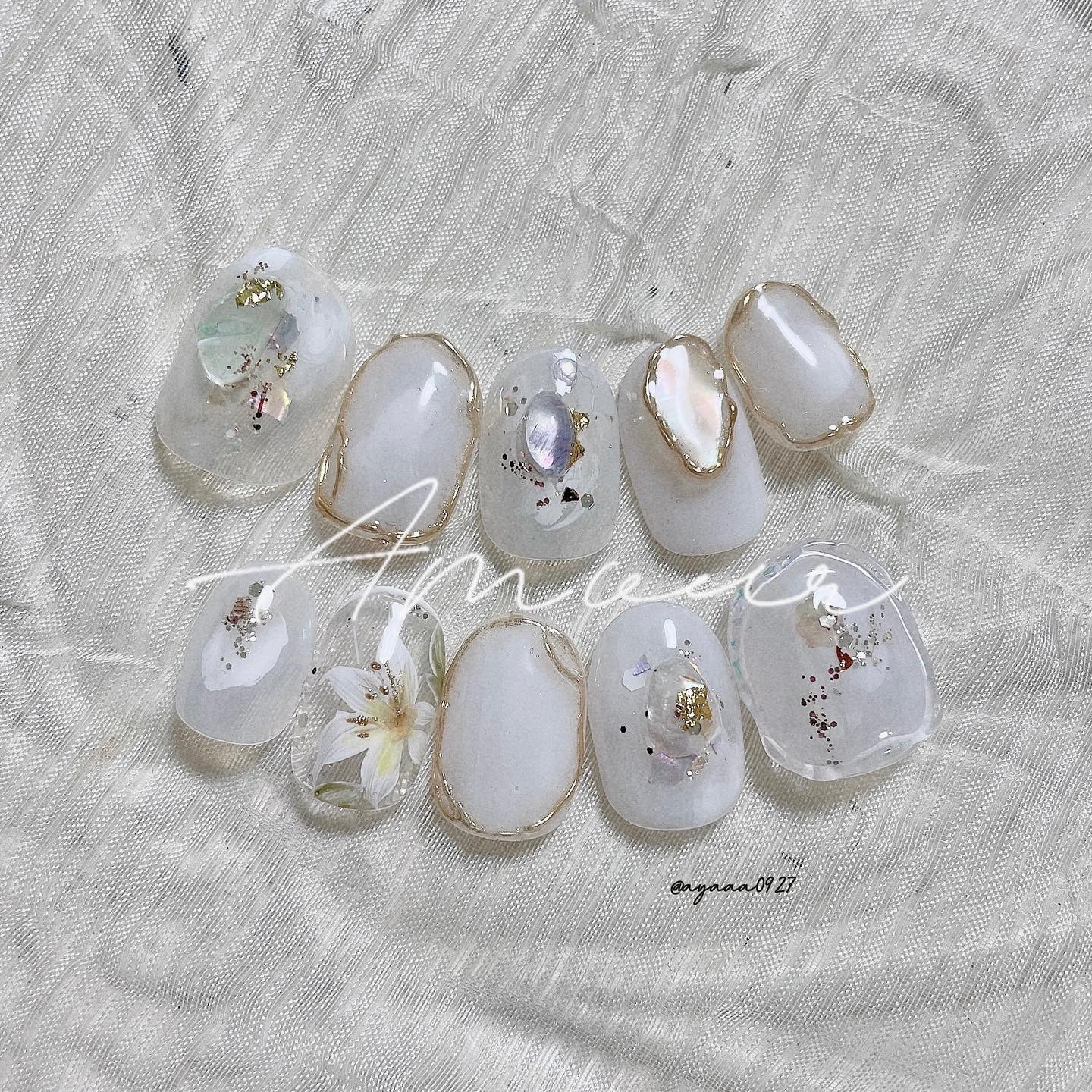 #ユリネイル,#ホワイトネイル,#ブライダルネイルのネイルデザイン