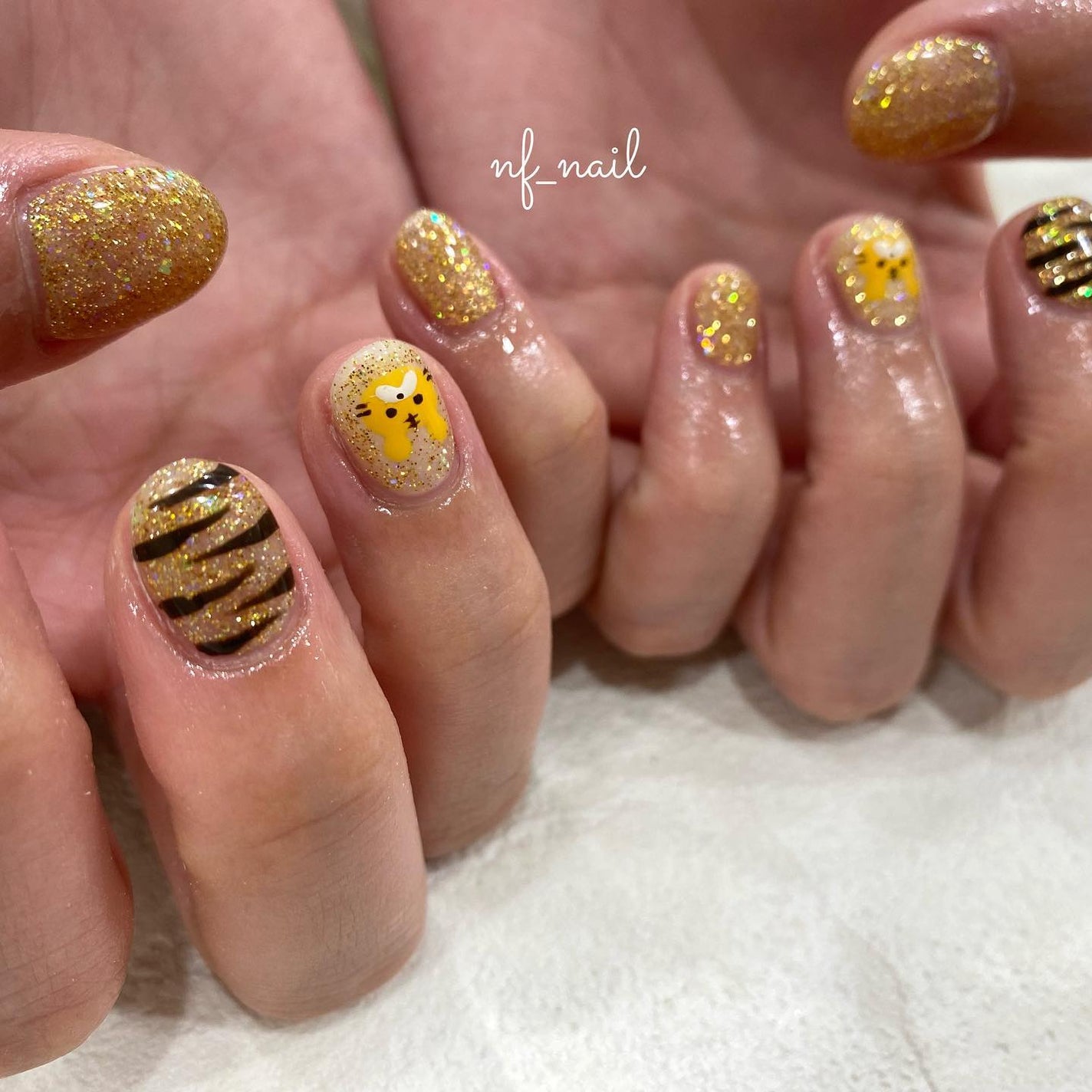 Natsumi◎nailist on LIPS 「art.🐯🐯.#ネイルデザイン#虎ネイル#とらネイル#トラネイ..」(2枚目)