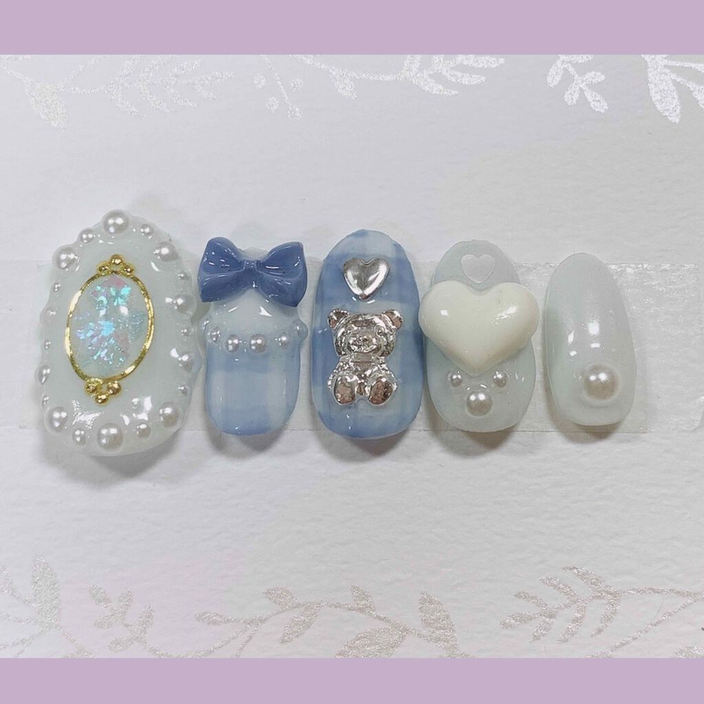 Maa໒꒱· ゚ on LIPS 「ブルーのリボンネイルインスタとメルカリのダブルフォローて..」(1枚目)