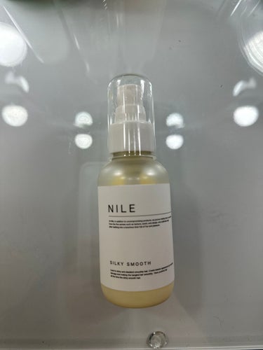 NILE ヘアミルク SILKY SMOOTHのクチコミ「香り重視のヘアミルクならこれ。

リンゴのような香りで男女ともに苦手な人は少なそう。
髪がすご.....」（1枚目）