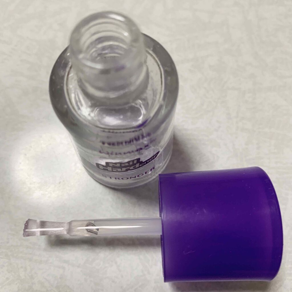 DAISO ウィンマックス ネイルハードナーのクチコミ「ダイソー　ウィンマックス　💜ネイルハードナー💅🏻
内容量:12mL　税抜き100円

綺麗な紫.....」（3枚目）