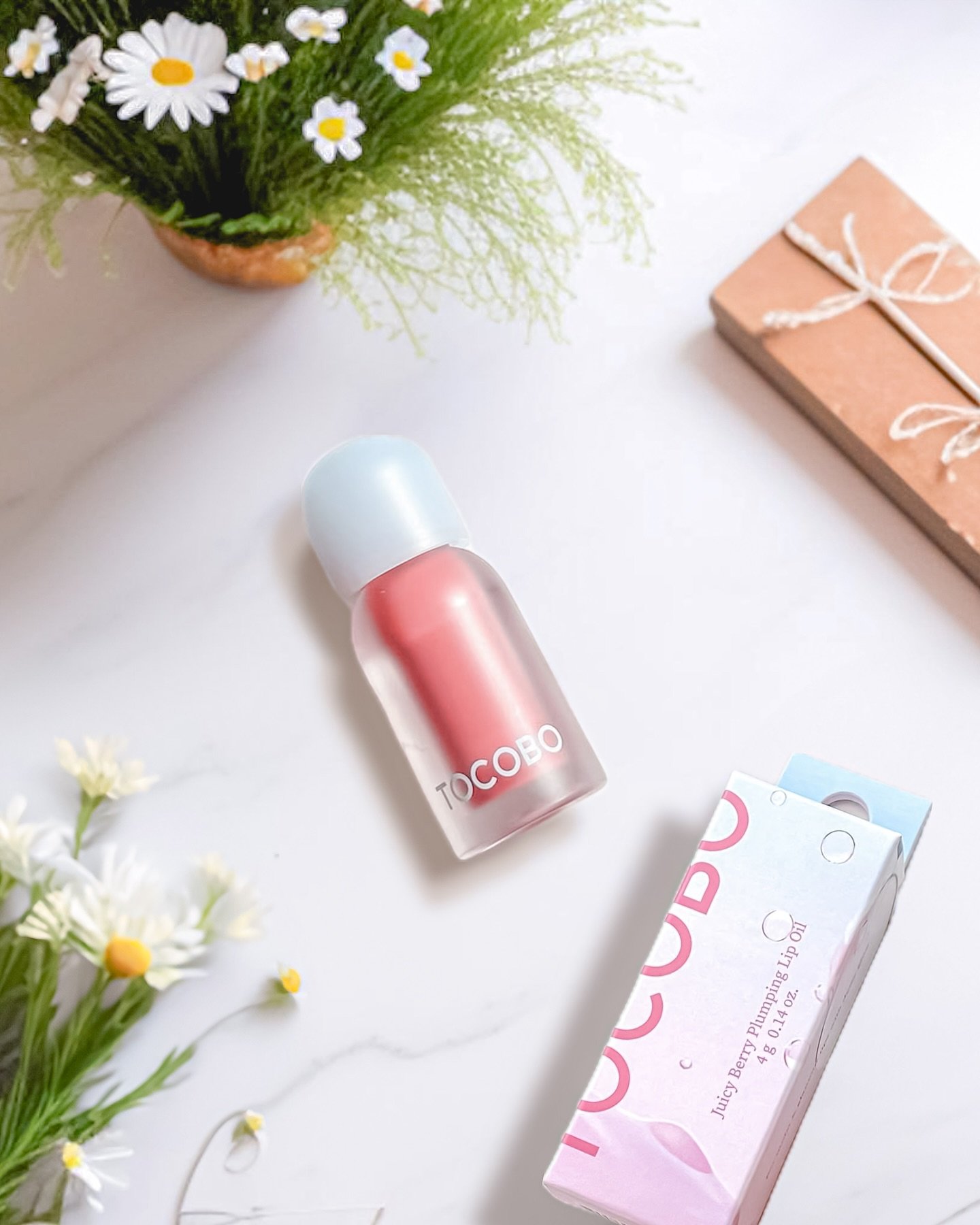 ジューシーベリープランピングリップオイル/TOCOBO/リップグロスを使ったクチコミ（3枚目）