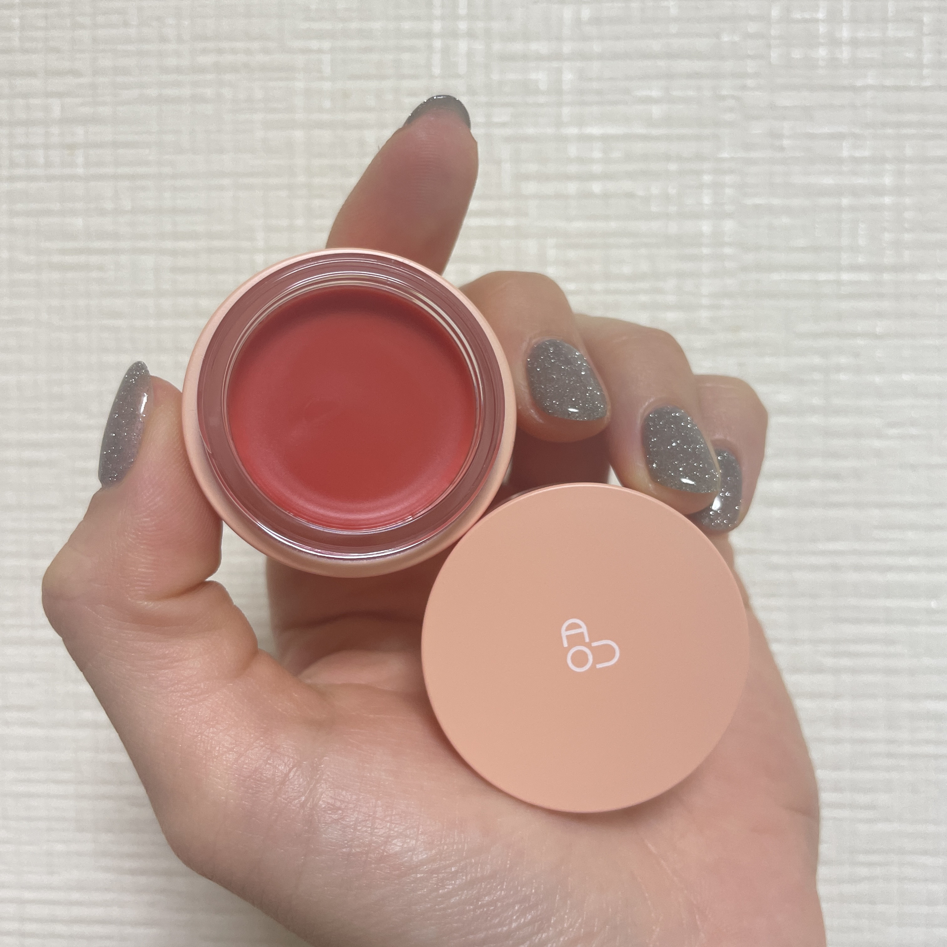 GLOWY TINT BALM 02 PERSIMMON BALM/AOU/リップグロスを使ったクチコミ（2枚目）