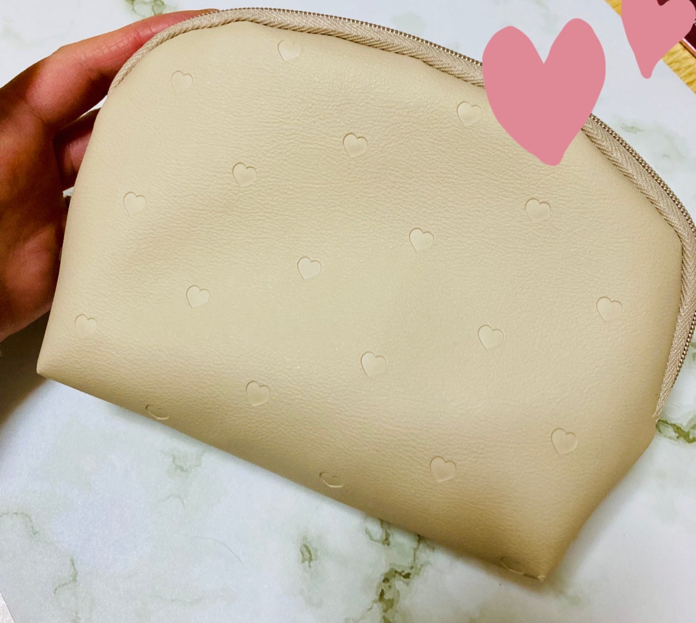 yumix777 on LIPS 「セリアで購入したポーチです。ベージュの色と、片面が小さなハート..」(1枚目)