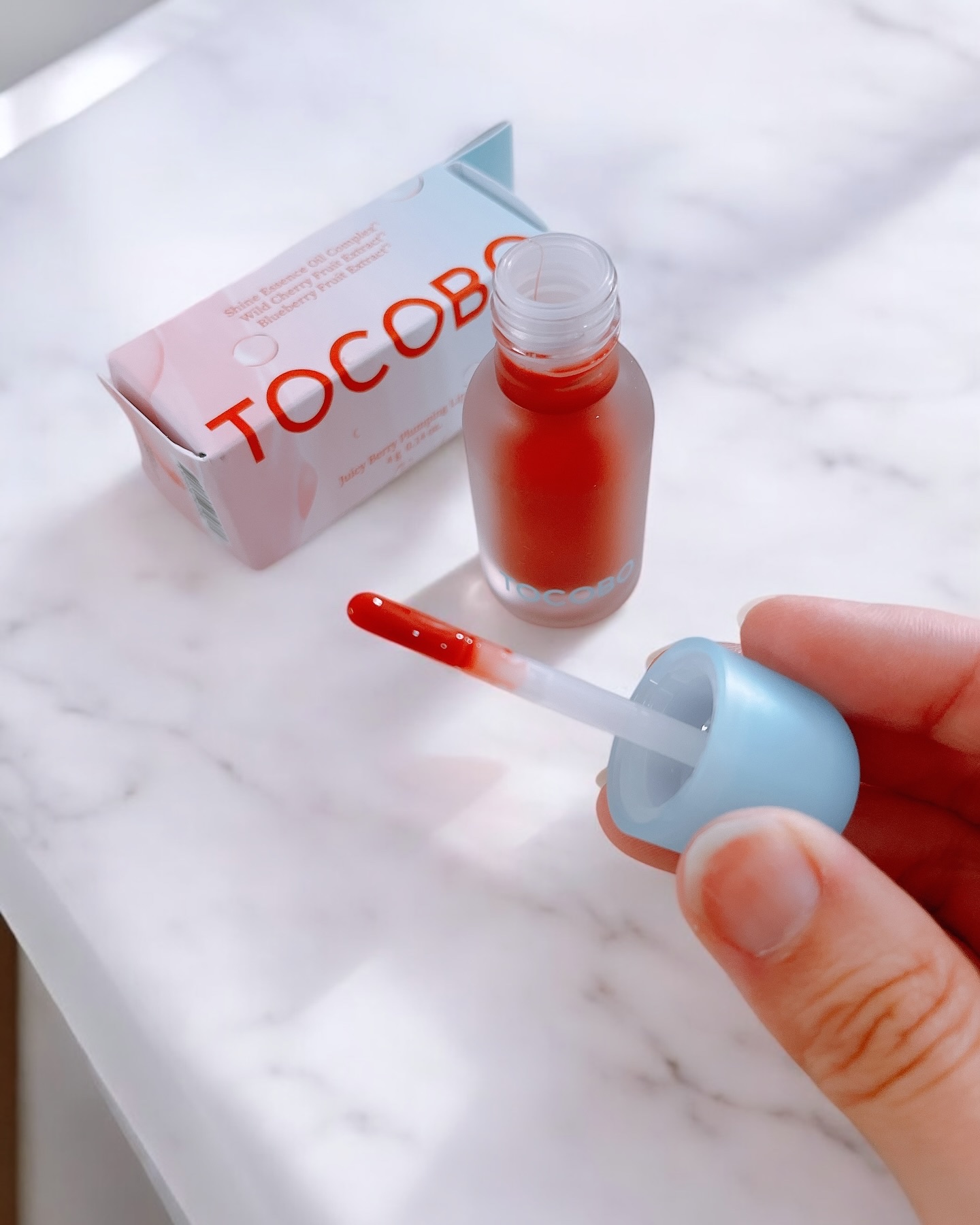 ジューシーベリープランピングリップオイル/TOCOBO/リップグロスを使ったクチコミ（2枚目）