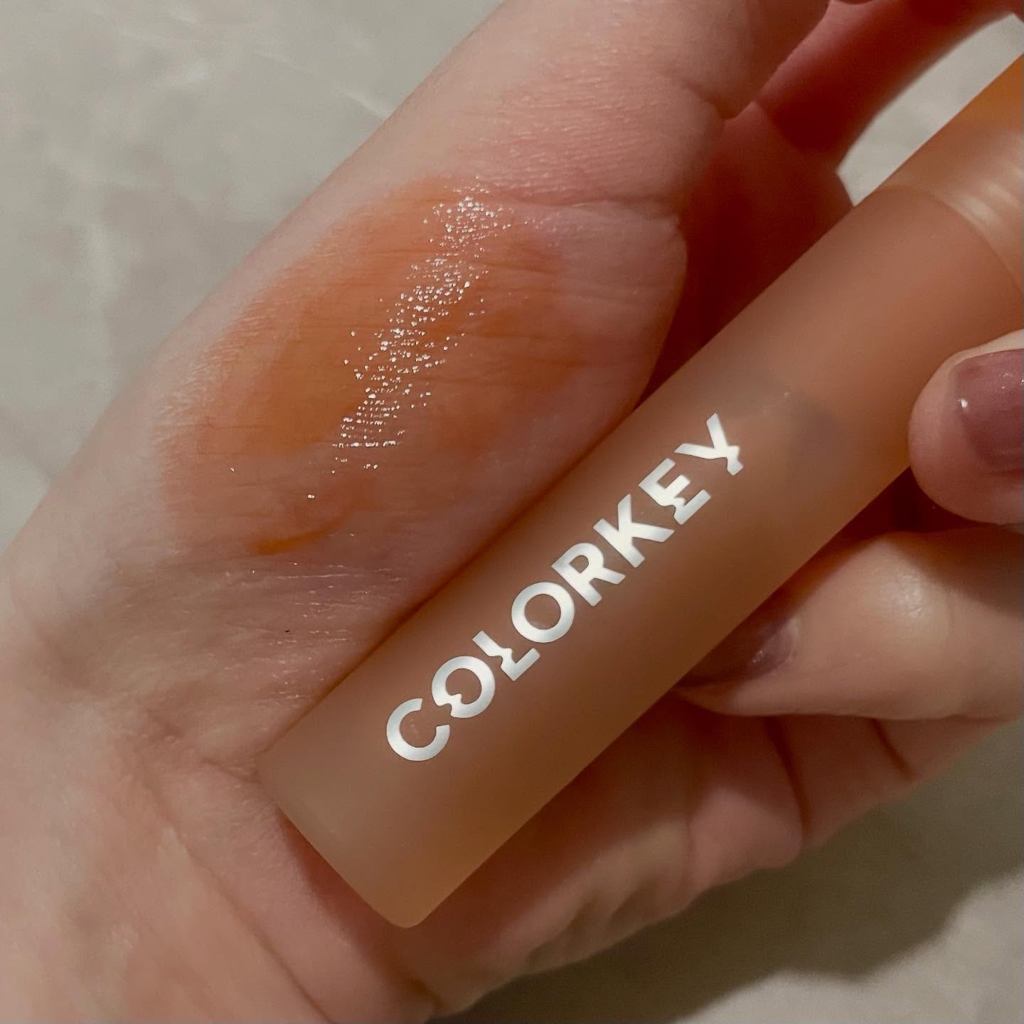 COLORKEY フリーズメモリ リップグロスのクチコミ「今日のリップ🧡
最近オレンジ系にハマってる〜
リニューアル前（？）のcolorkeyのティント.....」（2枚目）