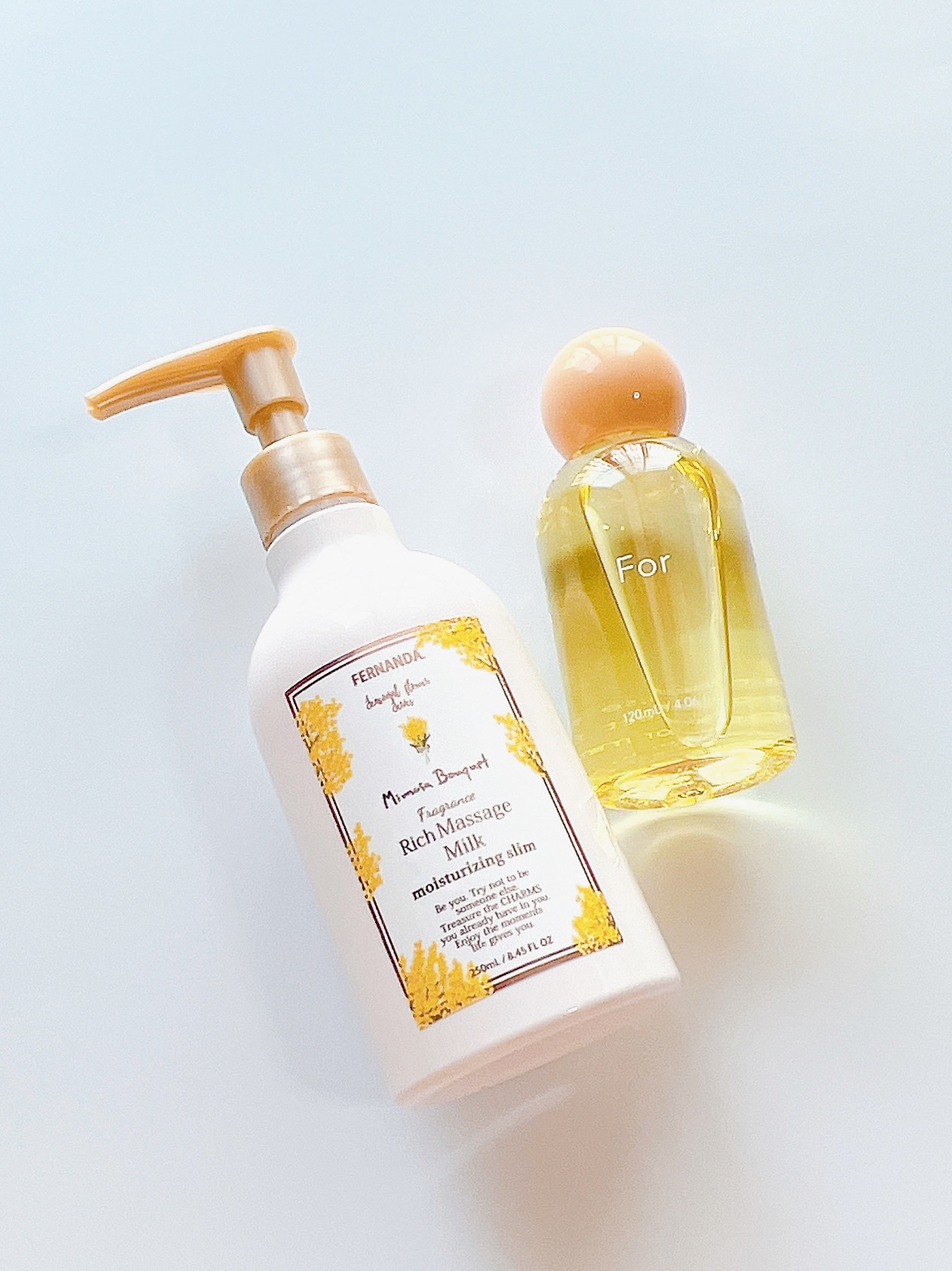 For オーセンティックUVケアオイルN 夏みかんの香りのクチコミ「最近の購入品。

フェルナンダのミモザブーケは
先に買った香水が気に入ったので
マッサージミル.....」（1枚目）