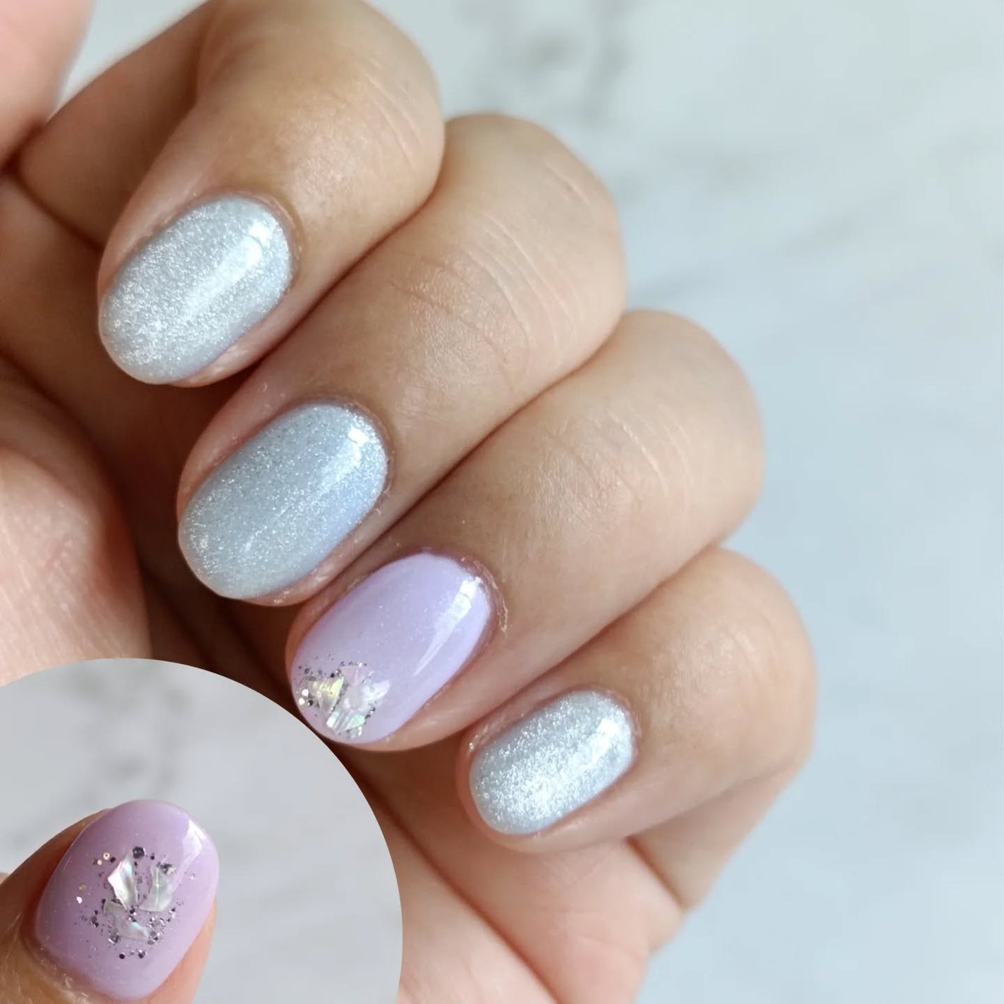 たろちゃん🧡フォロバ100 on LIPS 「ネイル変えたー!親指まで入れてキレイに撮影するの難しい💦水色が..」(1枚目)