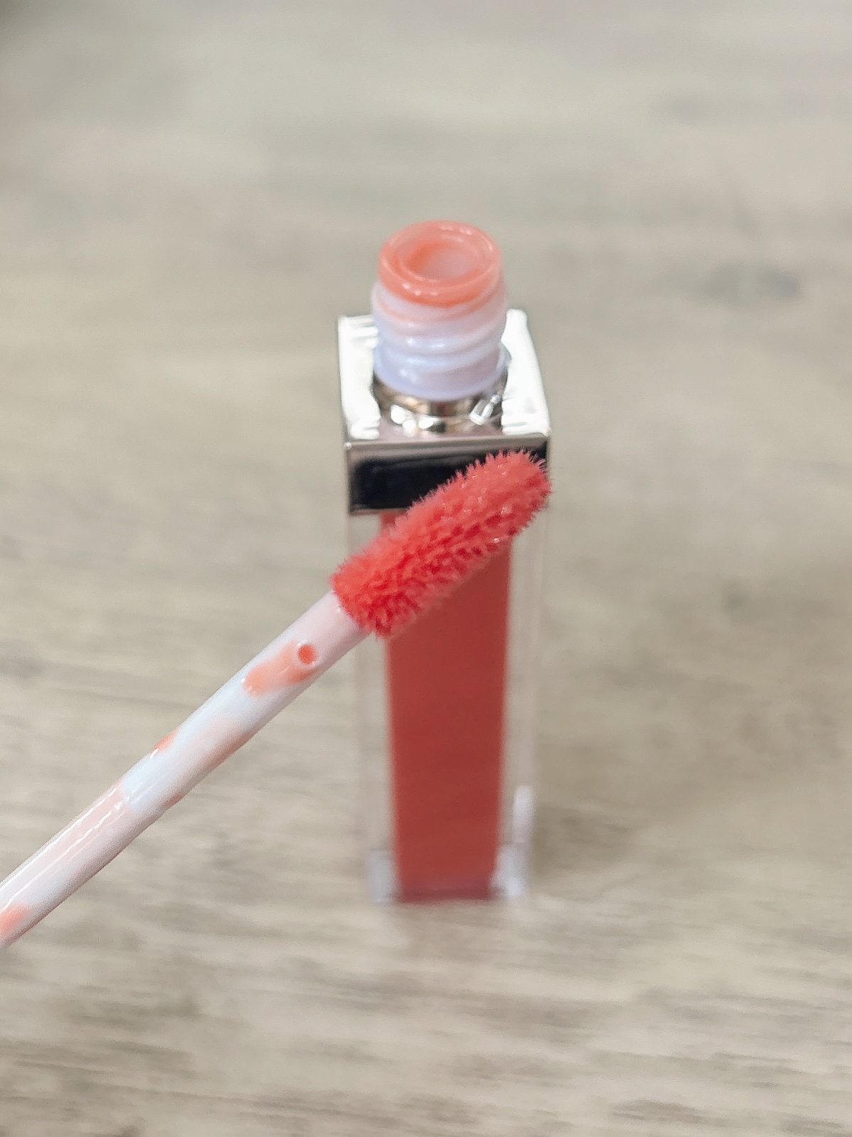 グロッシーリップオイル 03 サーモンオレンジ/SELVE/リップグロスを使ったクチコミ（2枚目）