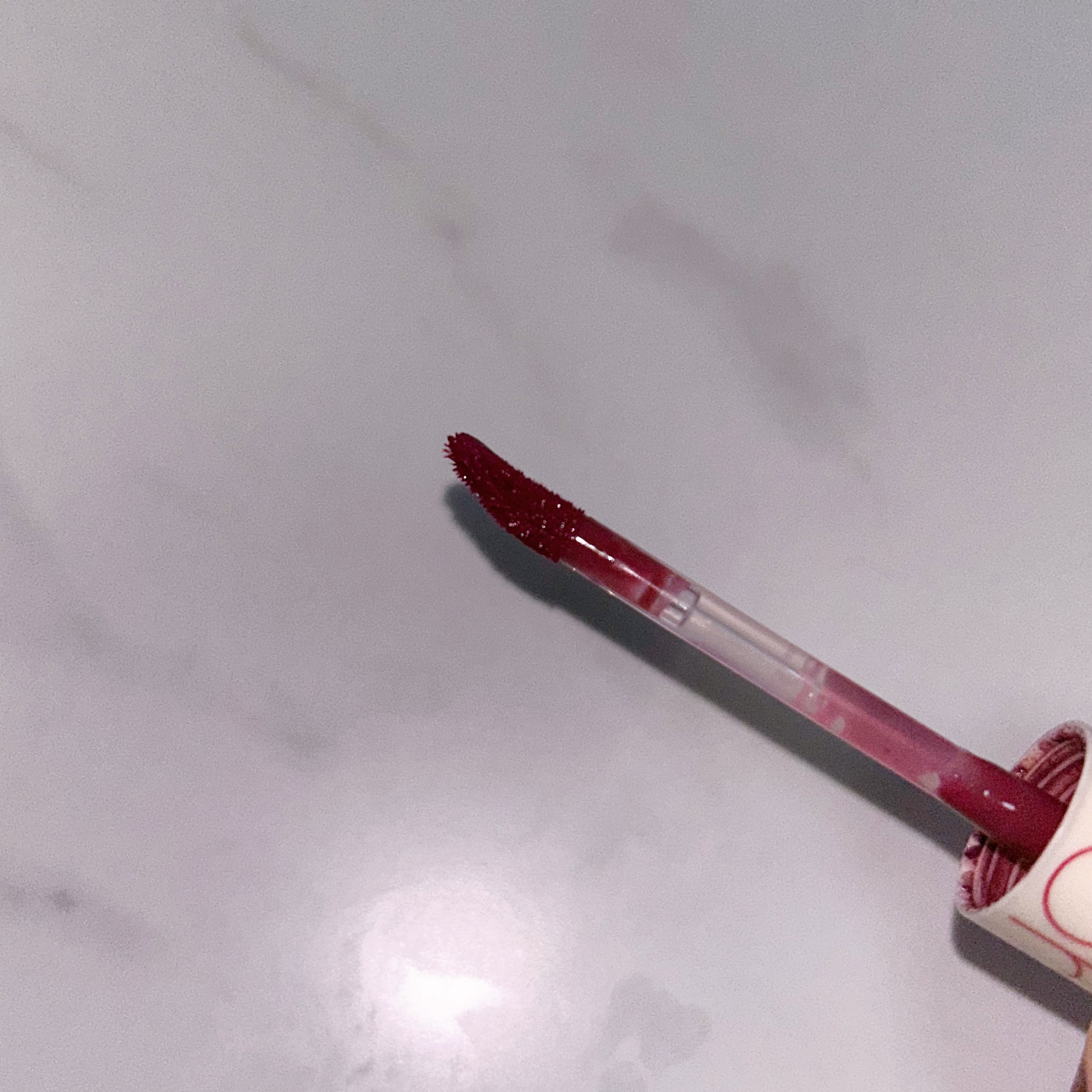 ジューシーラスティングティント/rom&nd/リップティントを使ったクチコミ（2枚目）