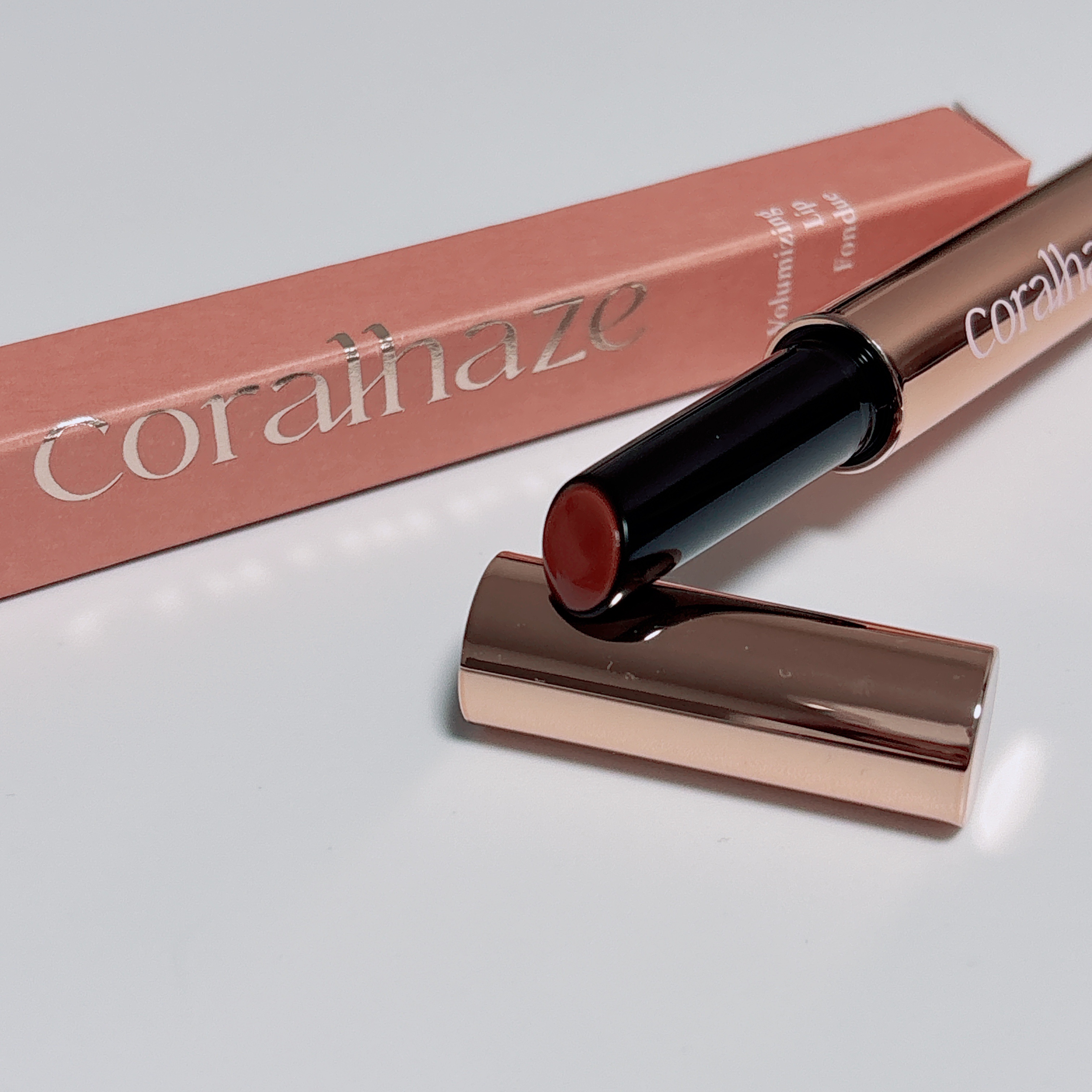 ボリューマイジングフォンデュリップ B03 スタニング/Coralhaze/口紅を使ったクチコミ（1枚目）