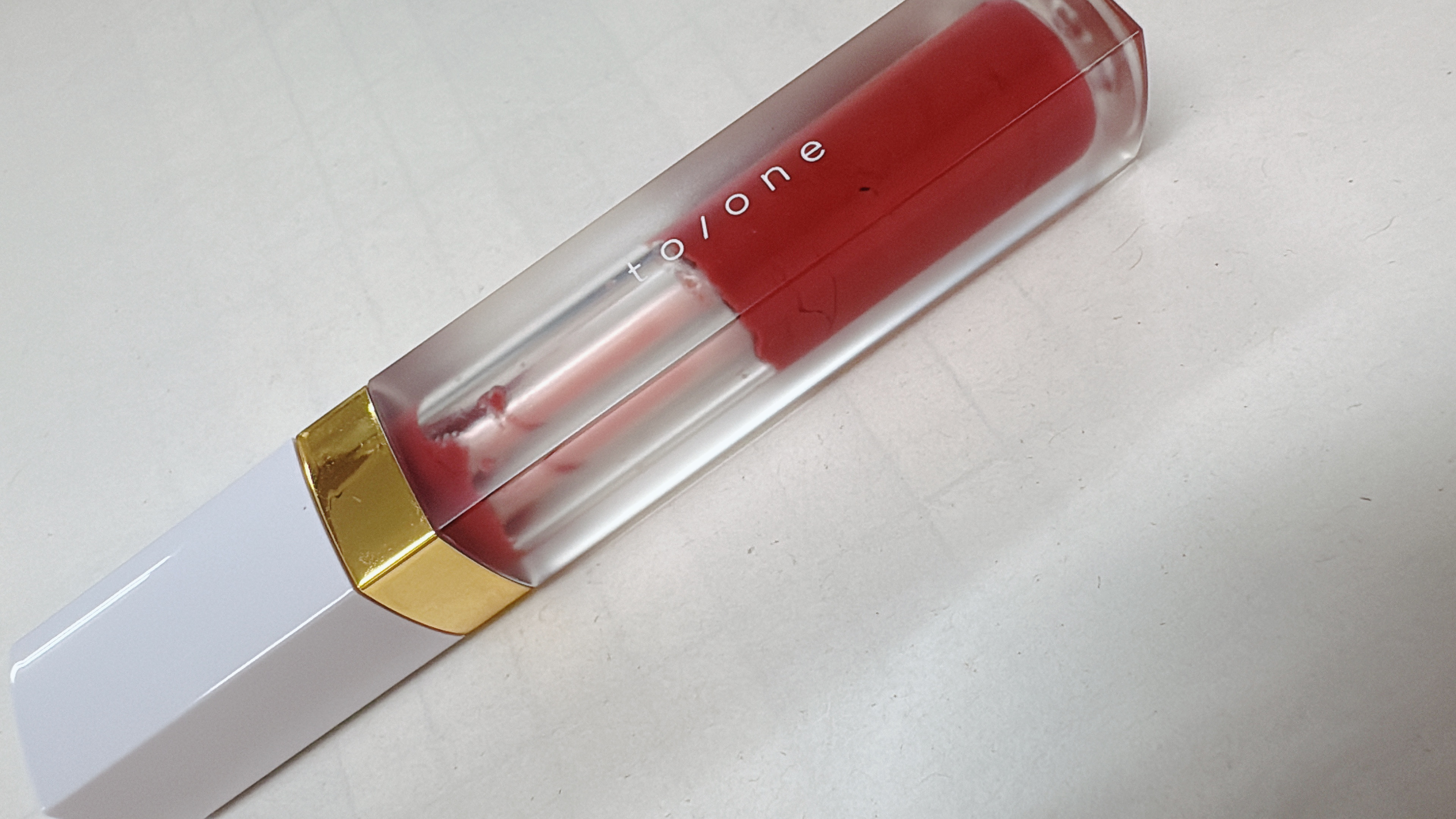 トーン ペタル エッセンス グロス 07 モーブブラウン/to/one/リップグロスを使ったクチコミ（1枚目）