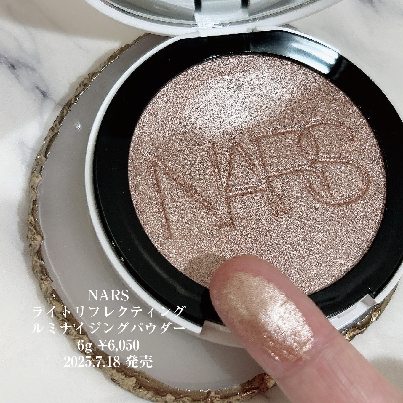 NARS ライトリフレクティング ルミナイジングパウダー/NARS/パウダーハイライトを使ったクチコミ(4枚目)