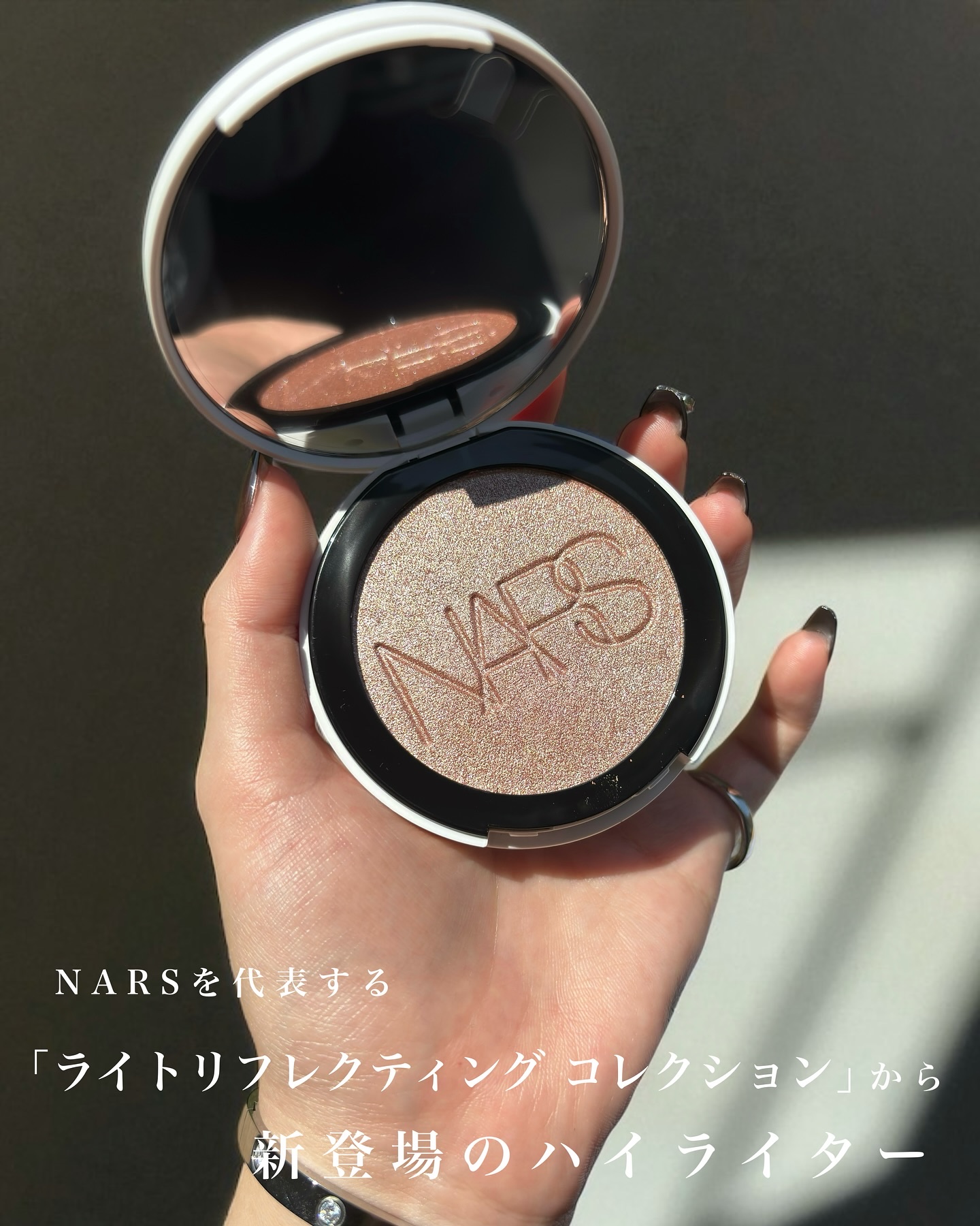 NARS ライトリフレクティング ルミナイジングパウダー/NARS/パウダーハイライトを使ったクチコミ（3枚目）