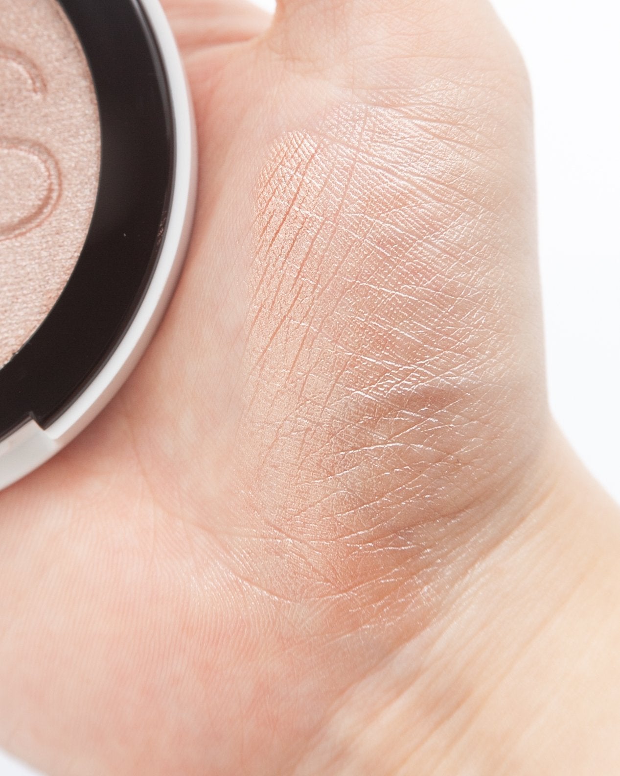 NARS ライトリフレクティング ルミナイジングパウダー/NARS/パウダーハイライトを使ったクチコミ(3枚目)