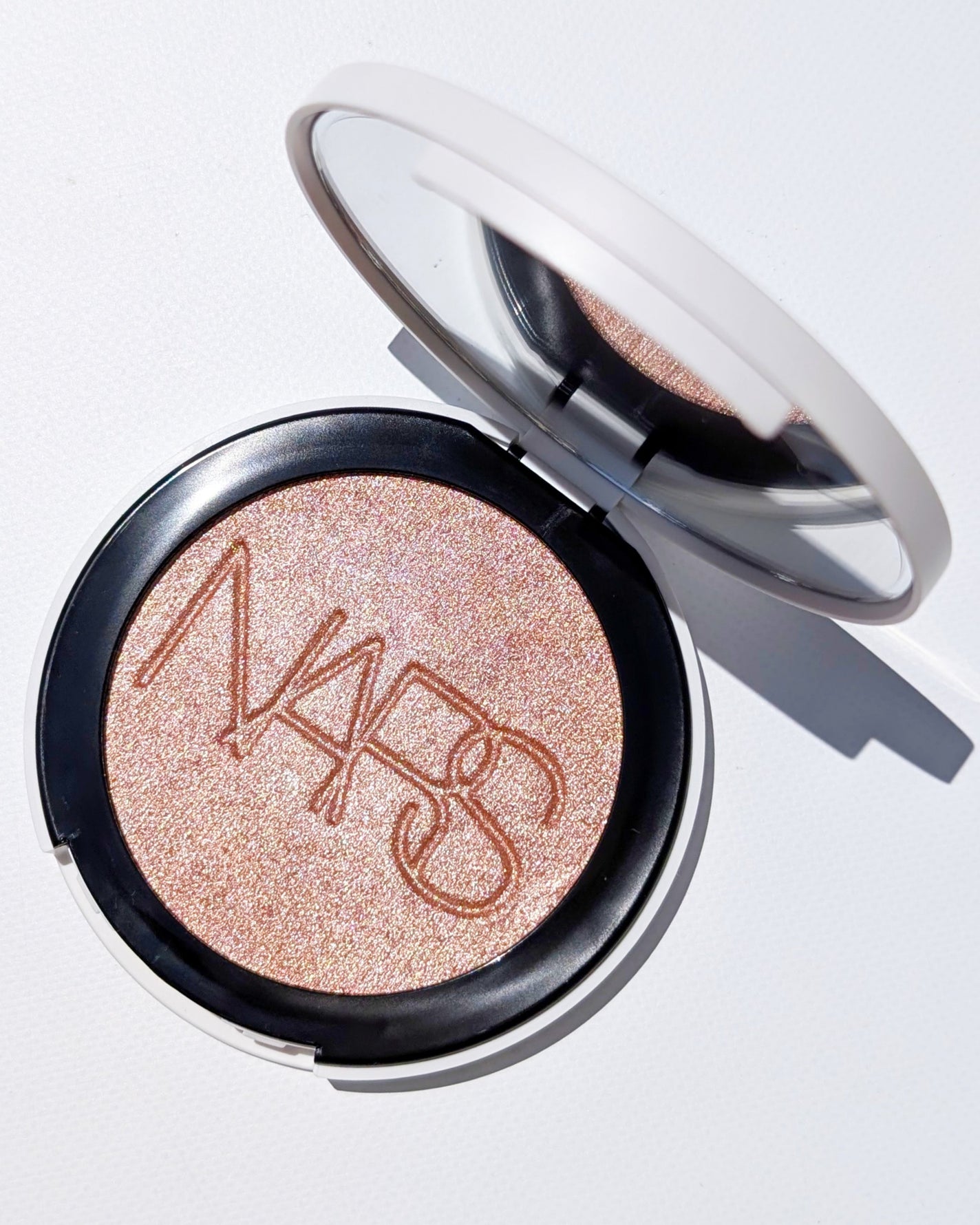 NARS ライトリフレクティング ルミナイジングパウダー/NARS/パウダーハイライトを使ったクチコミ(6枚目)