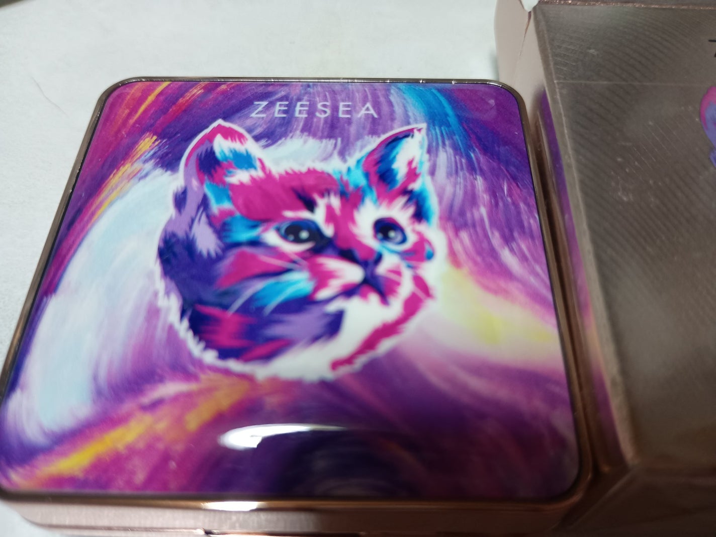 燃えるシャイニング女子 on LIPS 「勿体なくて開けてなかったズーシーのアイカラー4色パレット猫の手..」(1枚目)