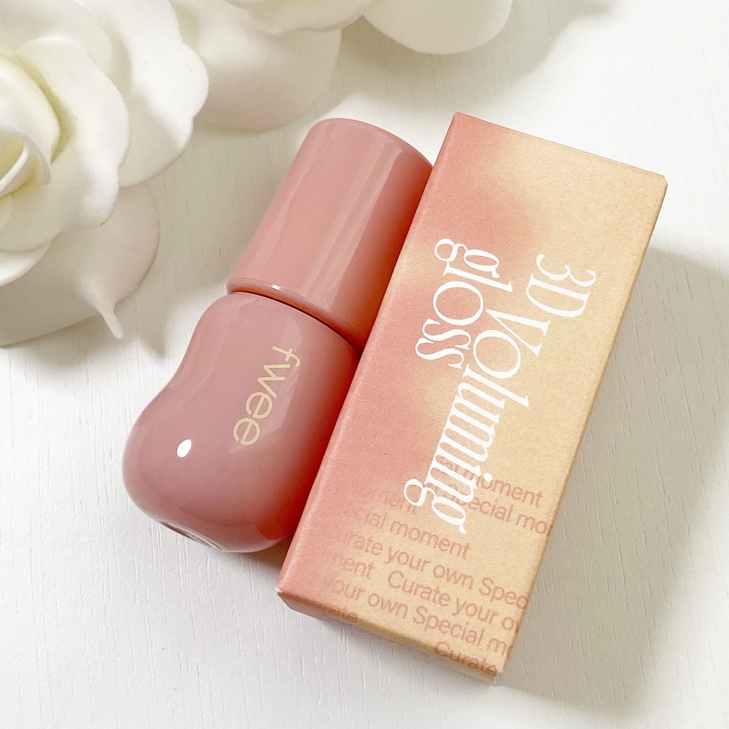 フィー 3Dボリューミンググロス B01 バニラ 70%/fwee/リップグロスを使ったクチコミ（1枚目）