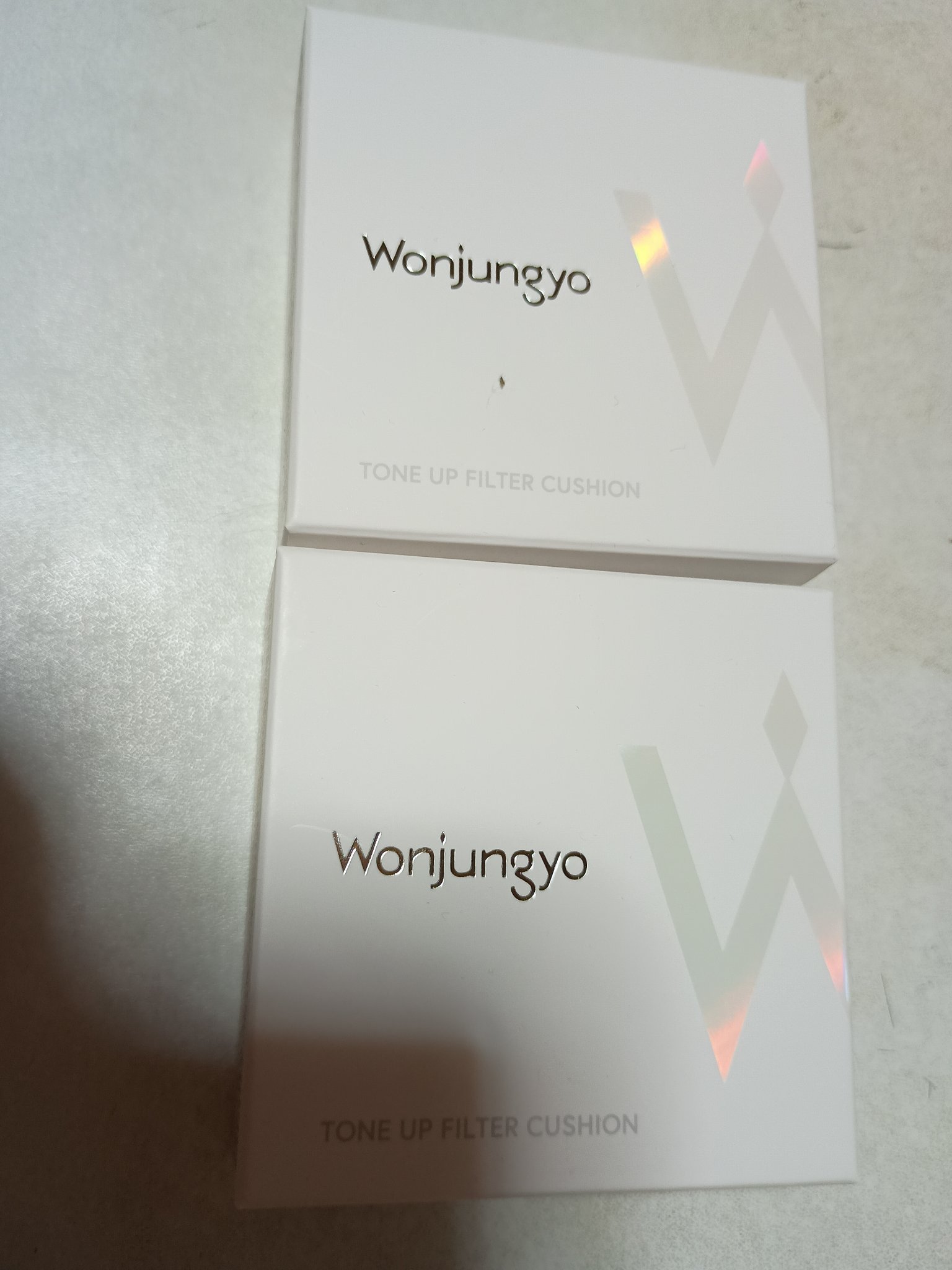 Wonjungyo ウォンジョンヨ　トーンアップ　フィルタークッションのクチコミ「実は買ってましたシリーズ✋
#ウォンジョンヨ トーンアップフィルタークッション
ホワイトとピン.....」（1枚目）