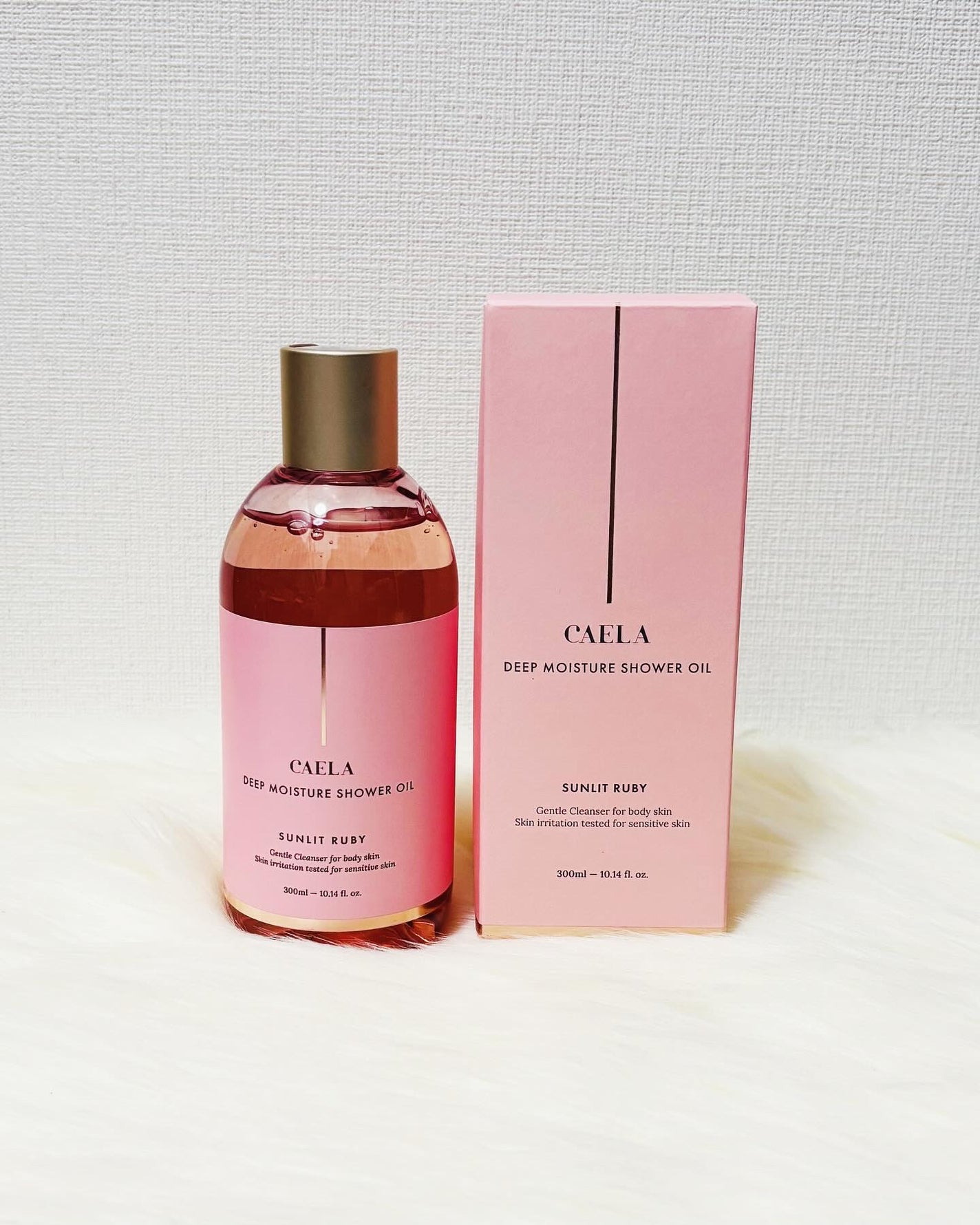 ディープモイスチャーシャワーオイル サンリット ルビー CAELA