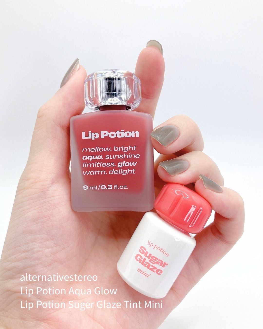 リップポーション アクアグロー 11 コーラルアンバー(日本限定)/alternativestereo/リップグロスを使ったクチコミ（2枚目）