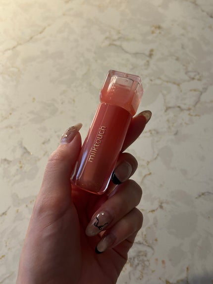 デューステインシアーリップグロス 03 ピオニーレイン/Milk Touch/リップグロスの画像