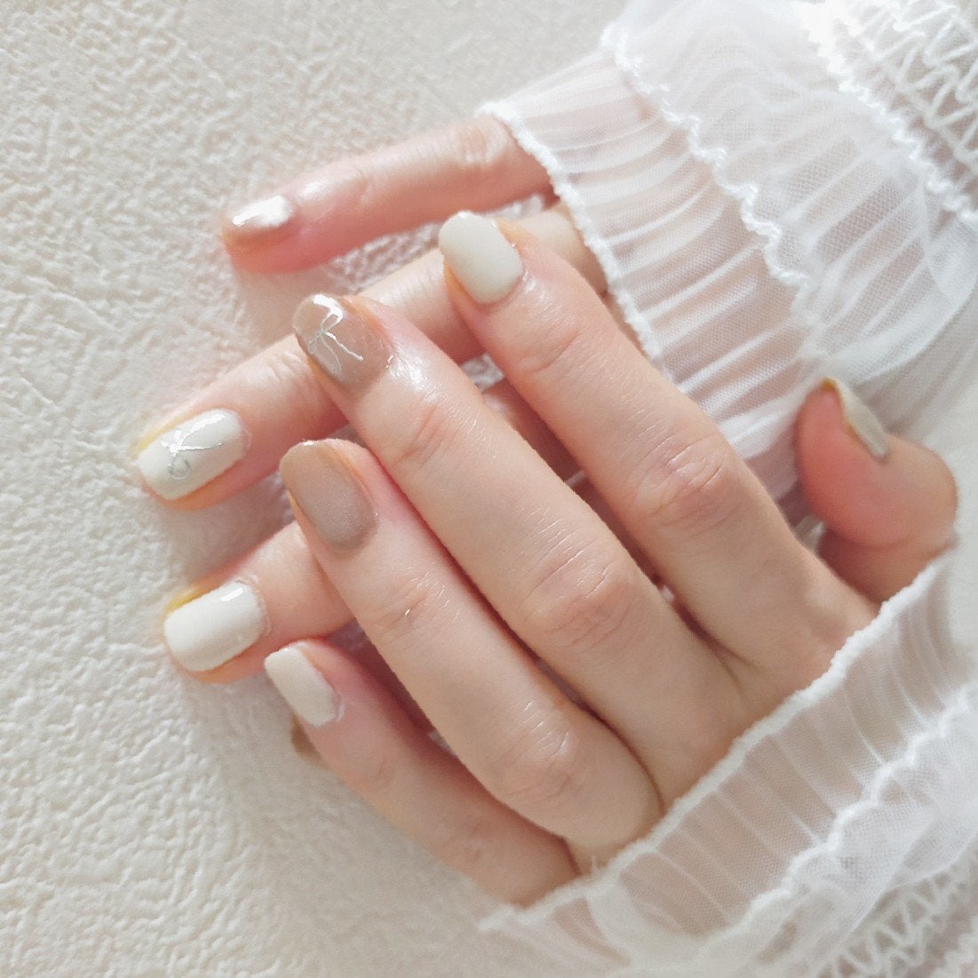 あちゃみん on LIPS 「ふんわりチャイネイルふんわりとしたブラウンカラーのマグネットと..」(1枚目)