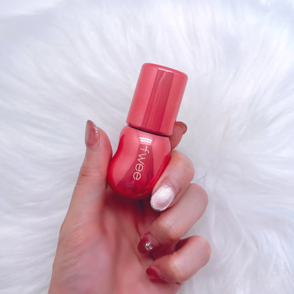 フィー 3Dボリューミンググロス B09 ライチ 70％/fwee/リップグロスを使ったクチコミ（2枚目）