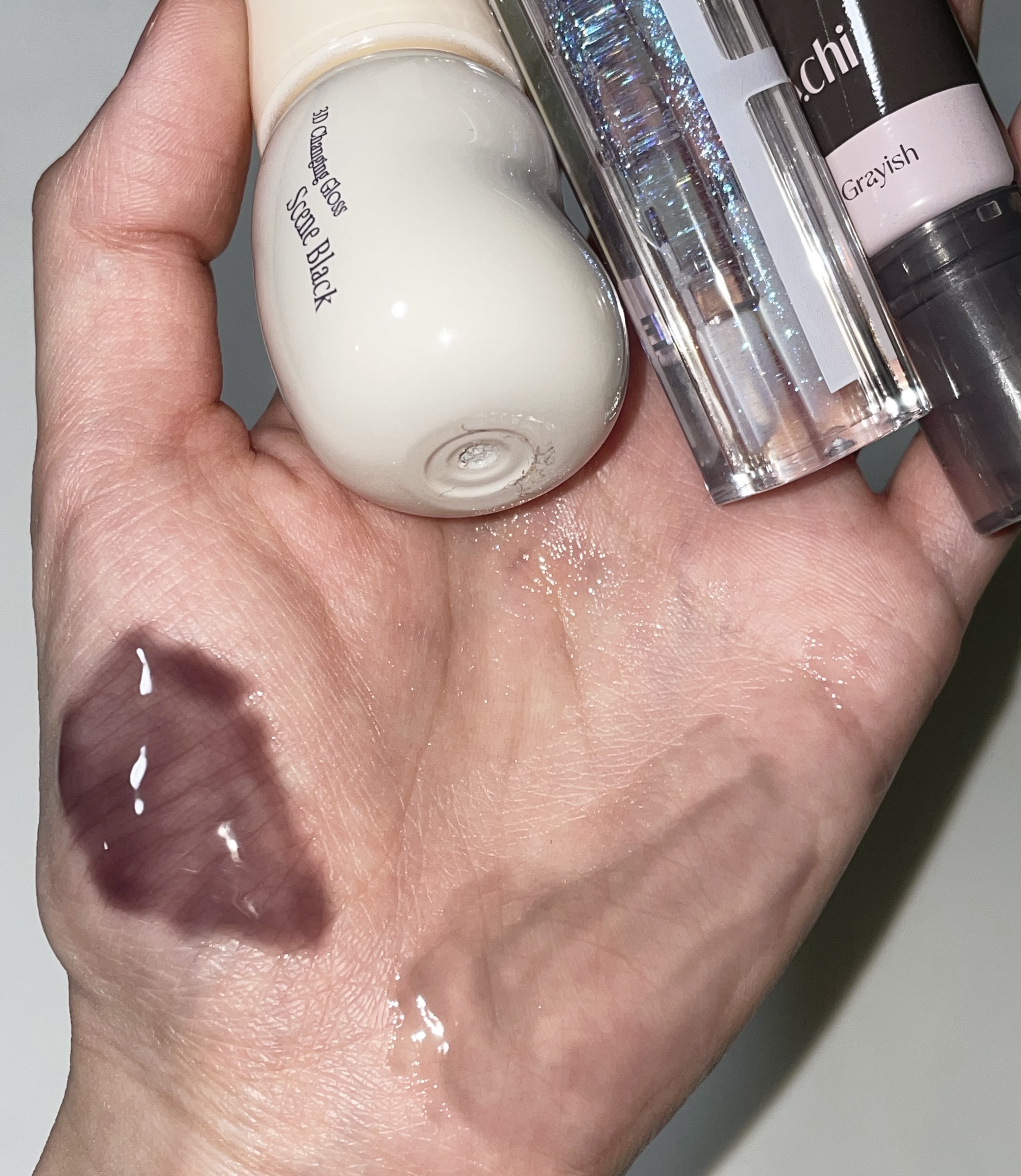 フィー 3Dチェインジンググロス 01 シーンブラック / fwee(フィー) | LIPS