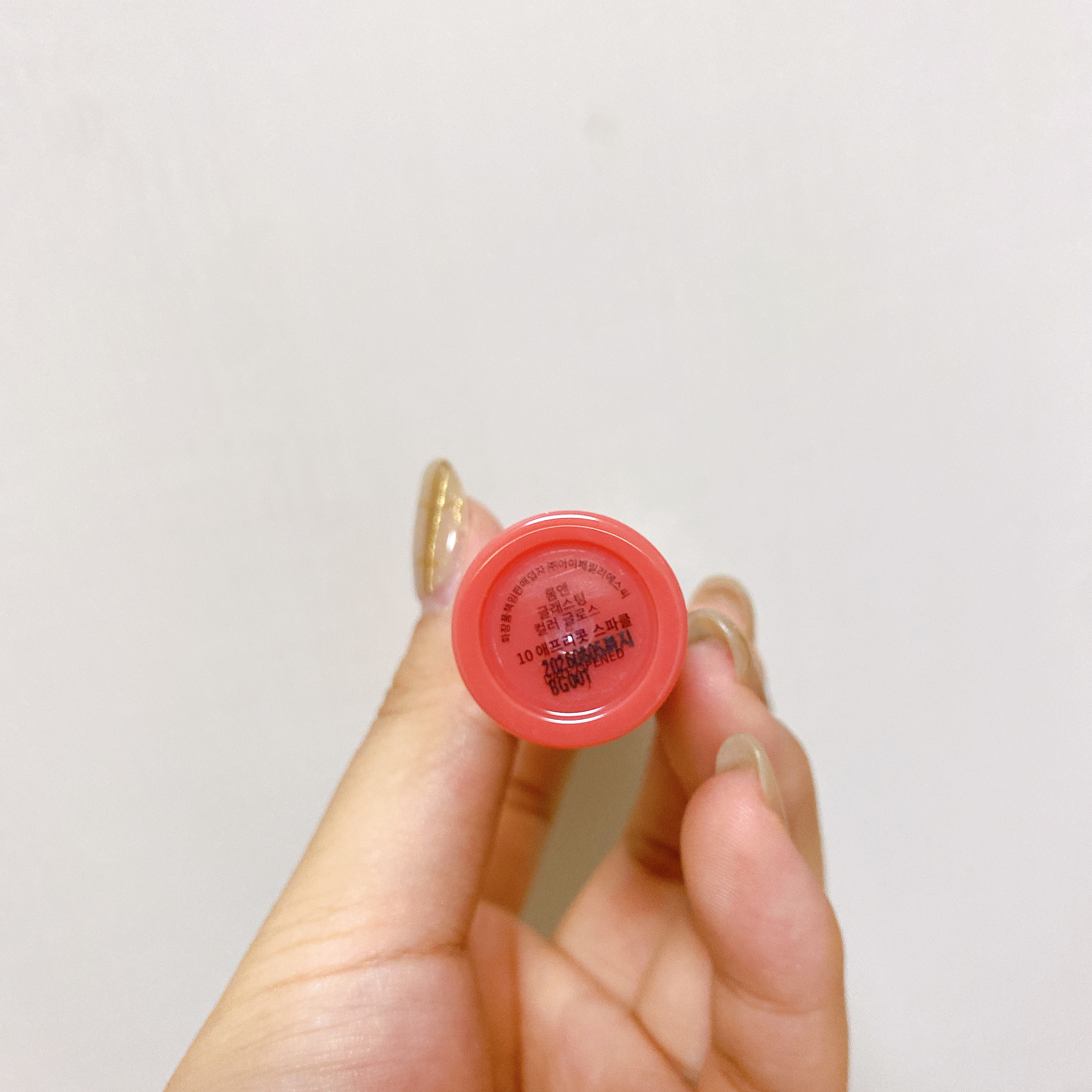 グラスティングカラーグロス 10 APRICOT SPARKLE (アプリコットスパークル)/rom&nd/リップグロスを使ったクチコミ（3枚目）