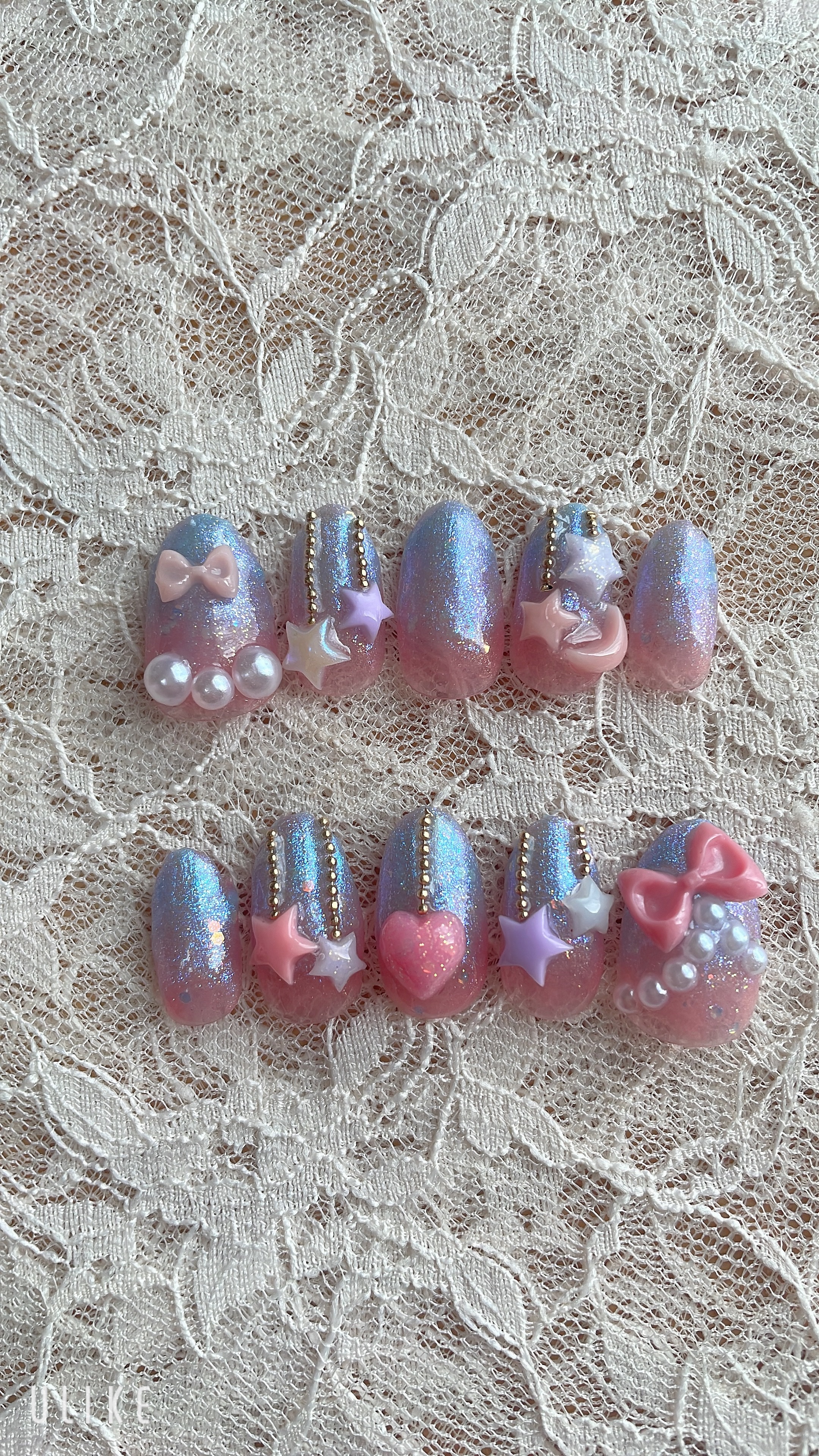 セリアジェルを使ってネイルチップ作成✨

使用ジェル
Seria フェアリーダストパープル
　　　シアーピンク

#セルフネイル #ネイルチップ