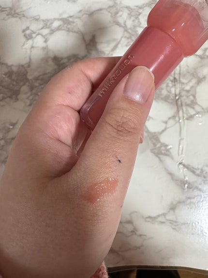 デューステインシアーリップグロス 05 ピーチドロップ/Milk Touch/リップグロスの画像