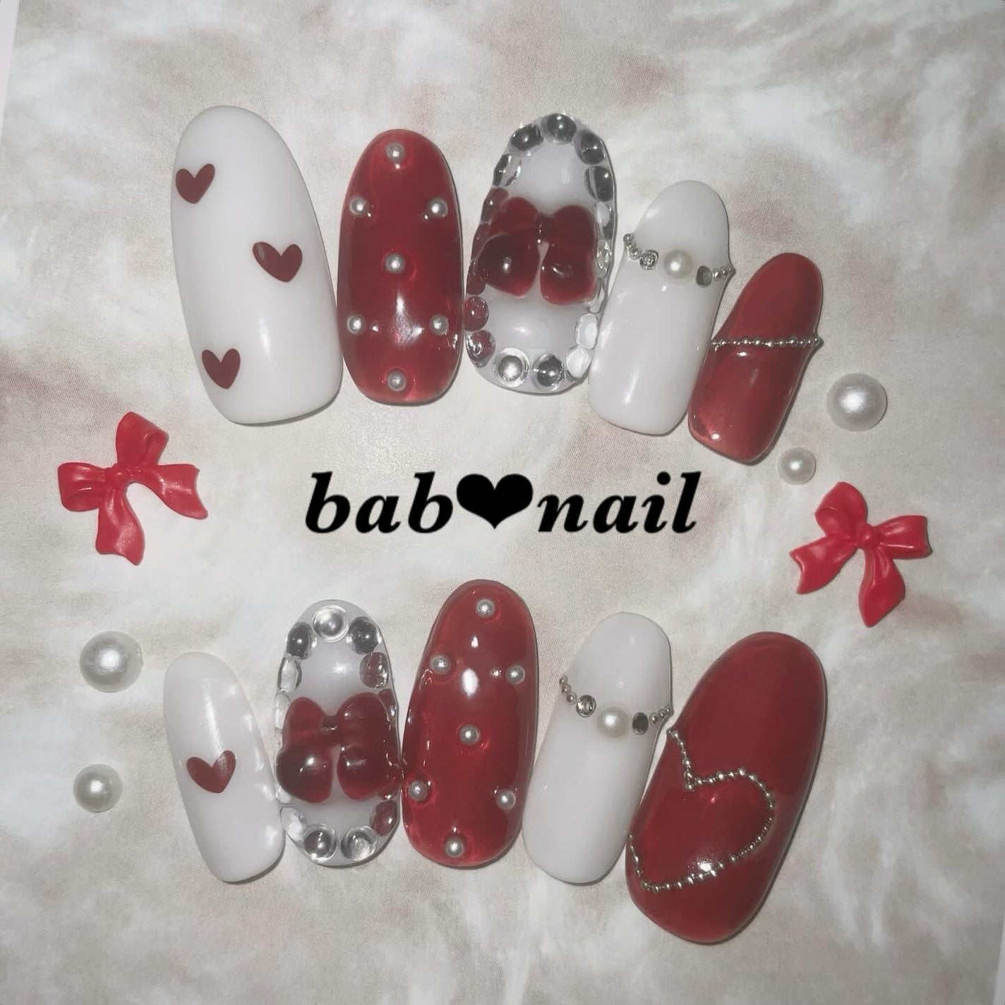 ばぶnail❤︎ネイルチップ on LIPS 「クリスマスにおすすめ♡ハートネイル❤︎赤×白のガーリーネ..」(1枚目)