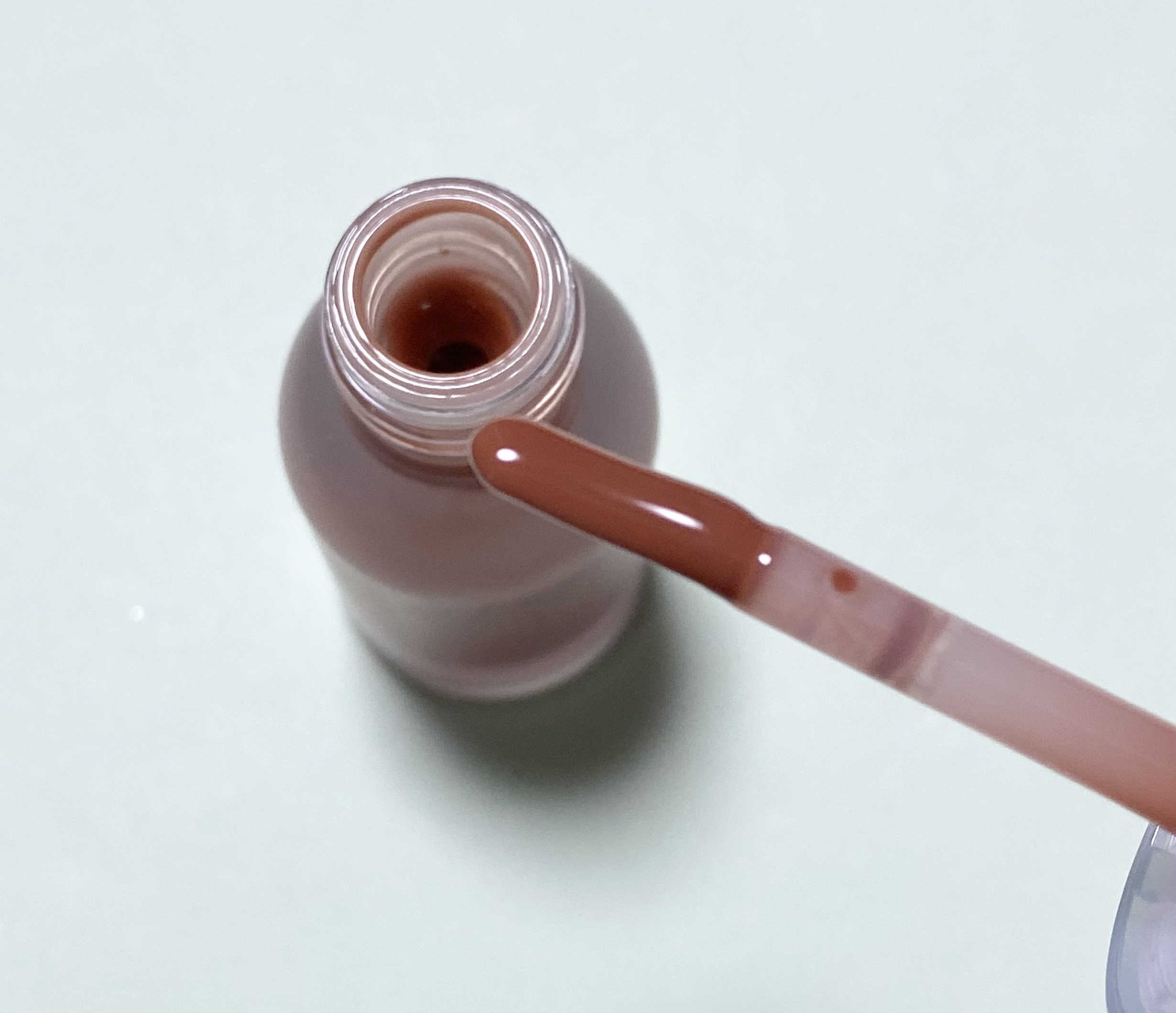 ジューシーベリープランピングリップオイル 04 ビターブラウン/TOCOBO/リップグロスを使ったクチコミ（2枚目）