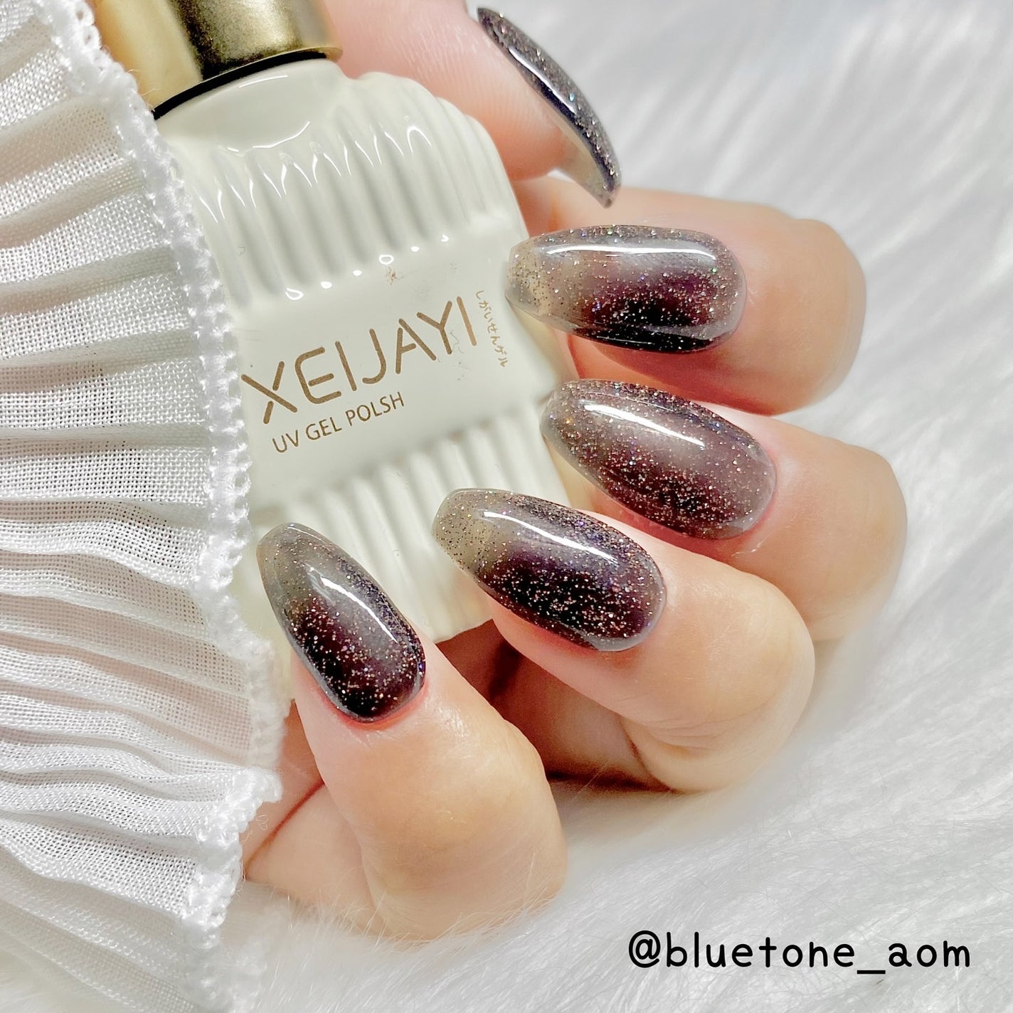 ⋆͛🦖⋆͛aomi on LIPS 「ブラック×ゴールドフラッシュシアーなブラックにオレンジっぽいゴ..」(1枚目)