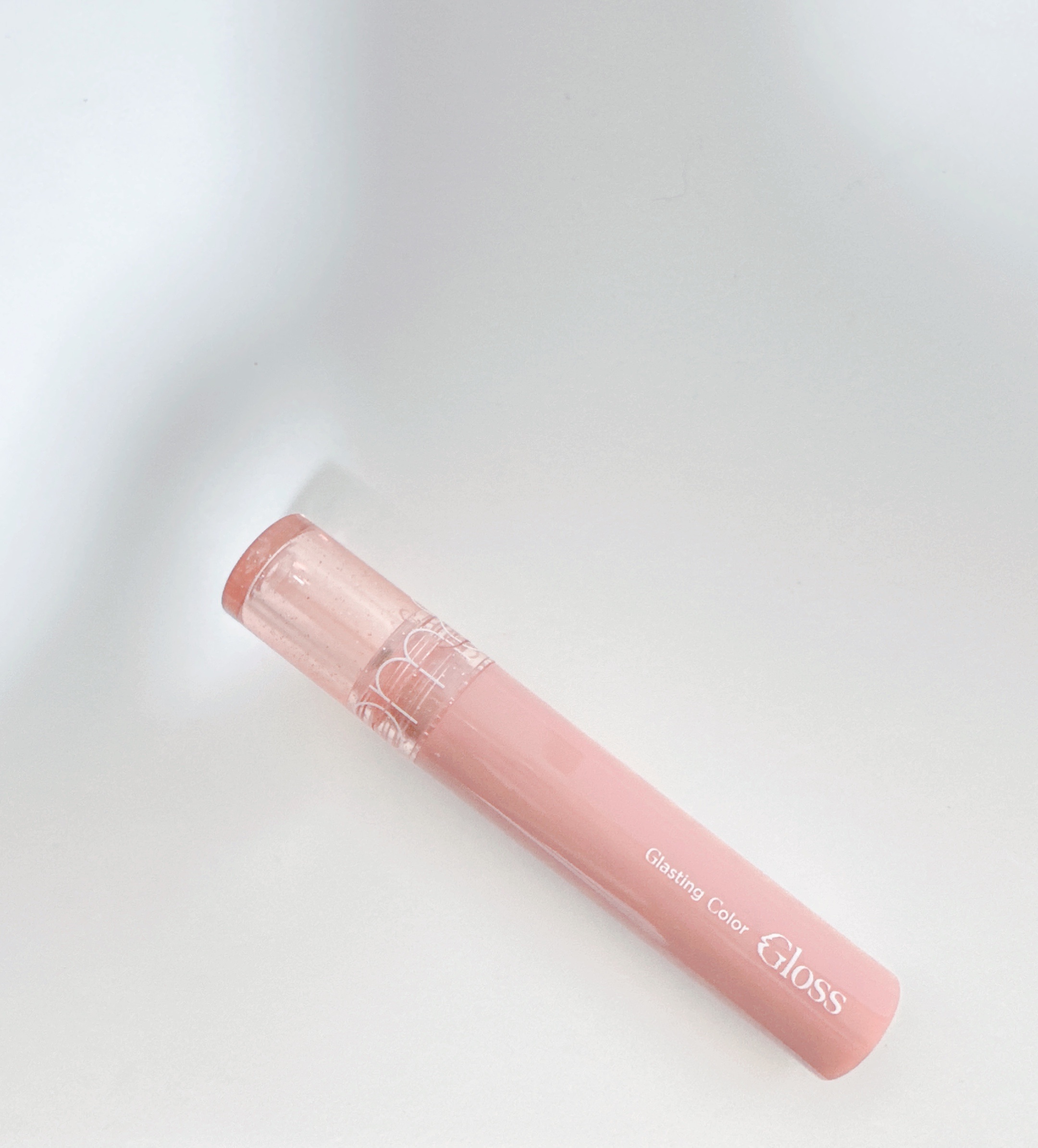 グラスティングカラーグロス 09 PEACH SPARKLE (ピーチスパークル)/rom&nd/リップグロスを使ったクチコミ（1枚目）