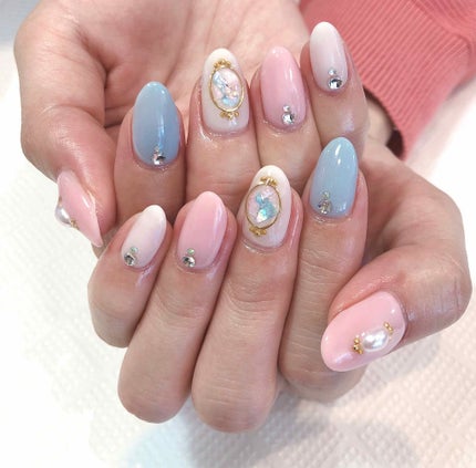 ゆっぴ*. on LIPS 「今回もネイル記録です✏️春夏っぽいなんとも言えないカラーに可愛..」(1枚目)