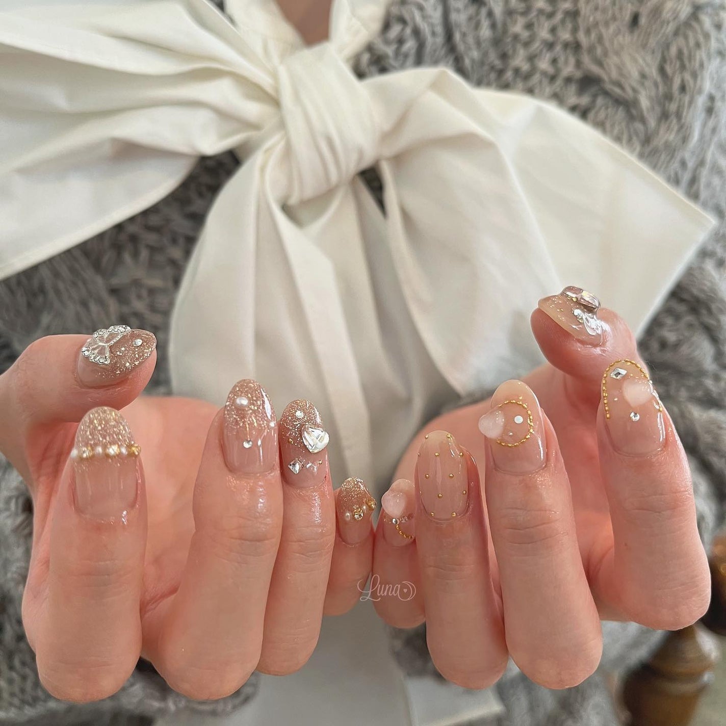 Iuna. Mizuki on LIPS 「.片手はおそろいにしてくださいました🫶🏻#nail#nails..」(2枚目)