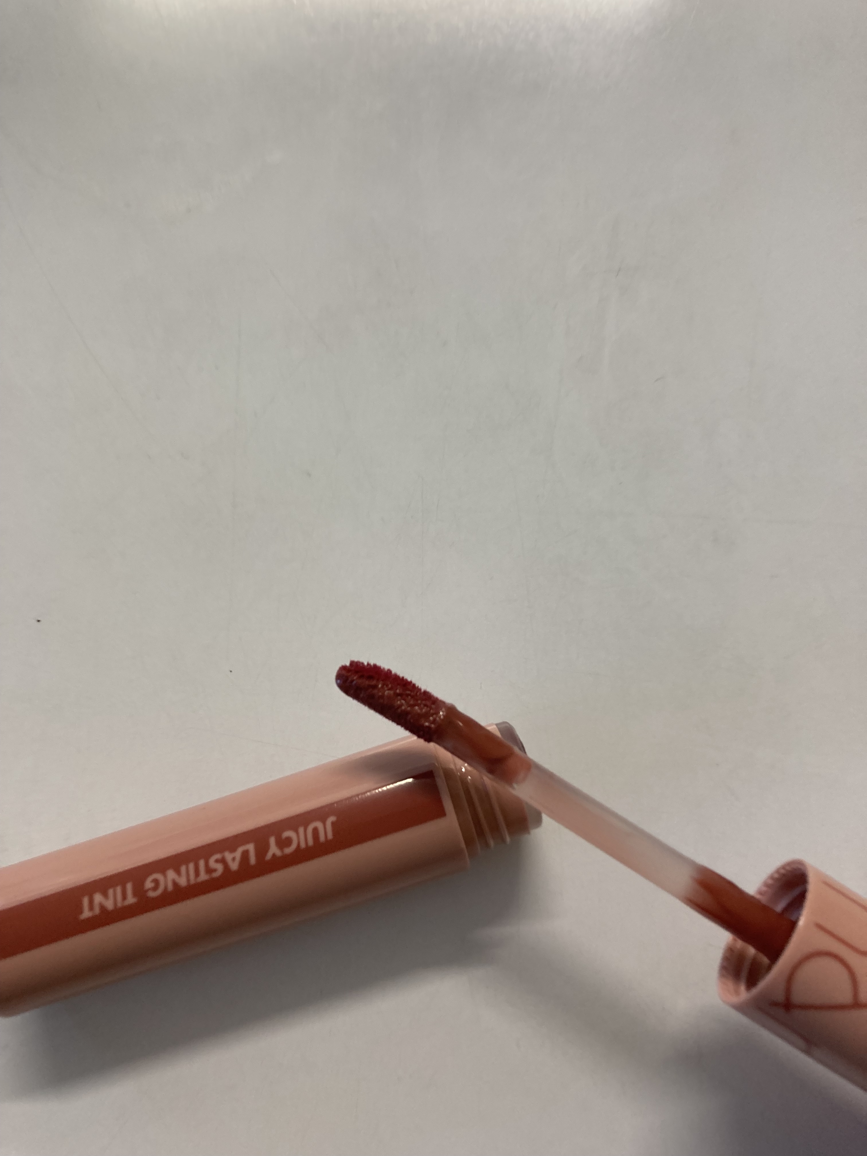 ジューシーラスティングティント 23 ヌカダミア(NUCADAMIA)/rom&nd/リップティントを使ったクチコミ（2枚目）