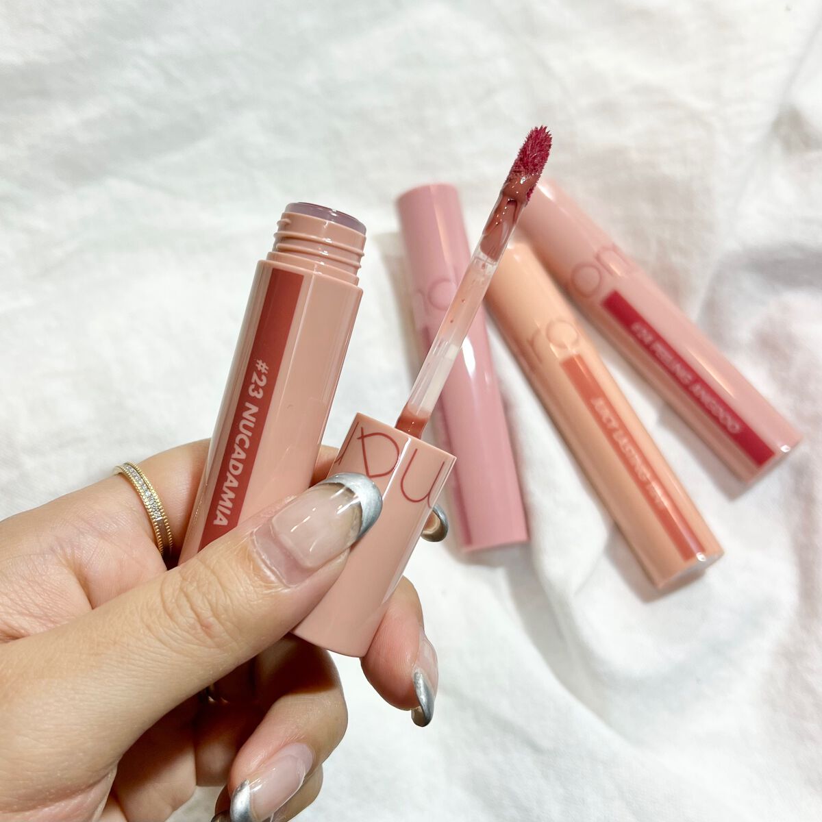 ジューシーラスティングティント/rom&nd/リップティントを使ったクチコミ(5枚目)