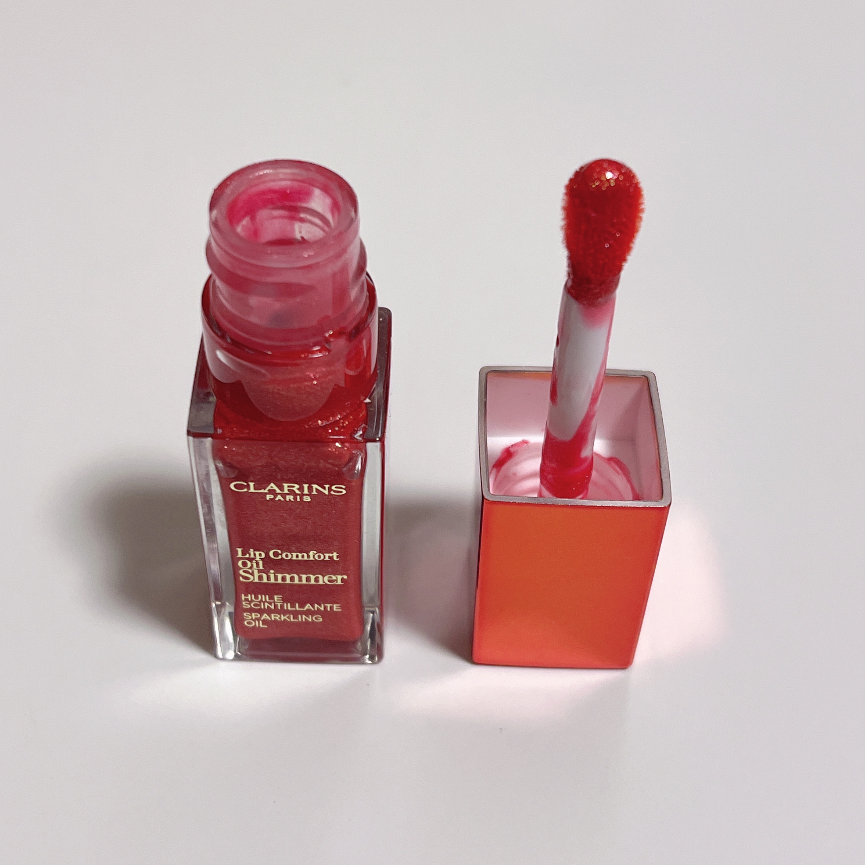コンフォート リップオイル シマー 07 レッドホット/CLARINS/リップグロスを使ったクチコミ（2枚目）